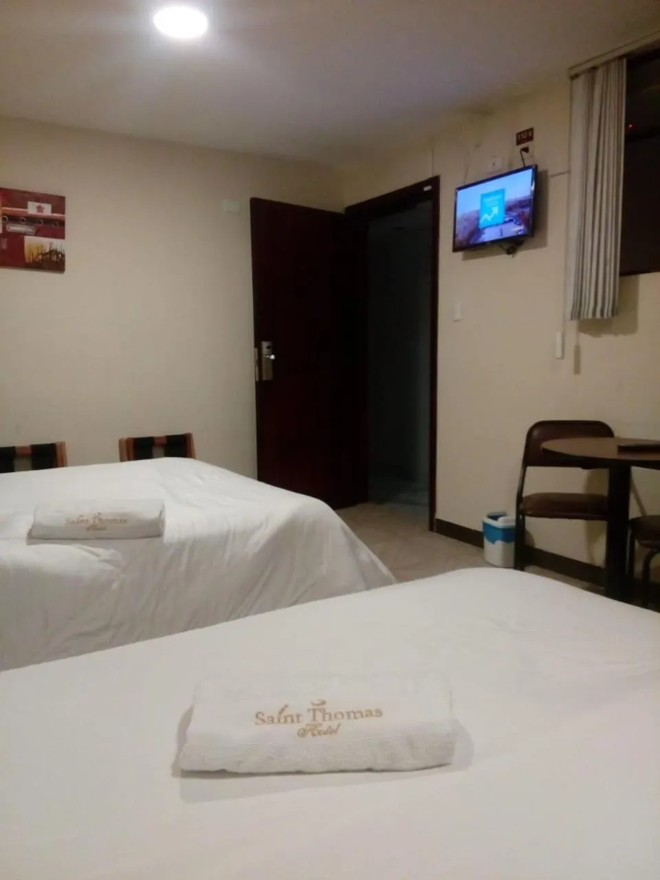 Communal lounge/ TV room, Bed in Hotel Saint Thomas