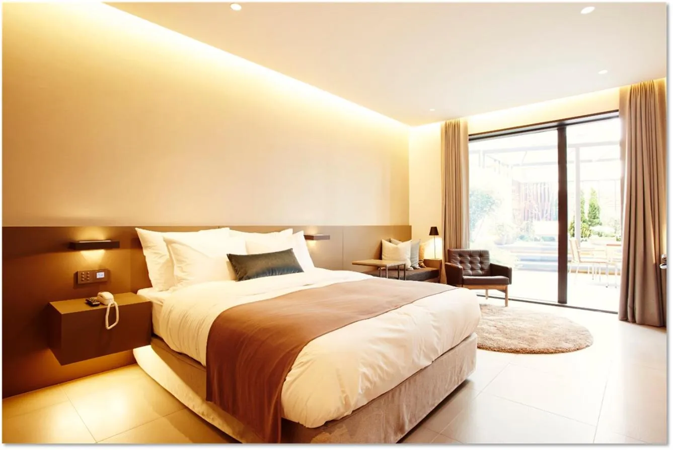 Bed in MD HOTEL Dongtan