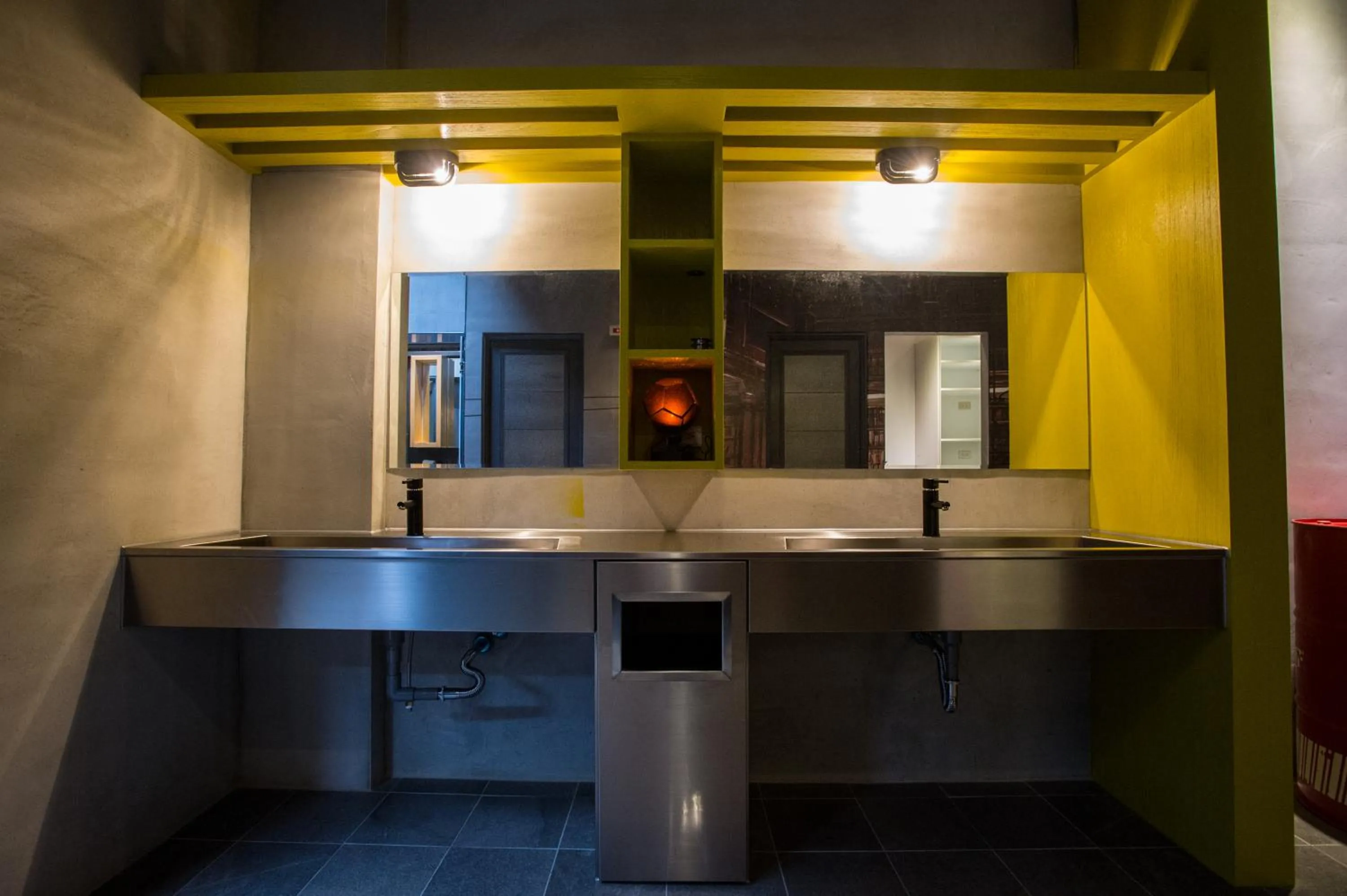 Communal lounge/ TV room in Just Walk Backpacker Hostel