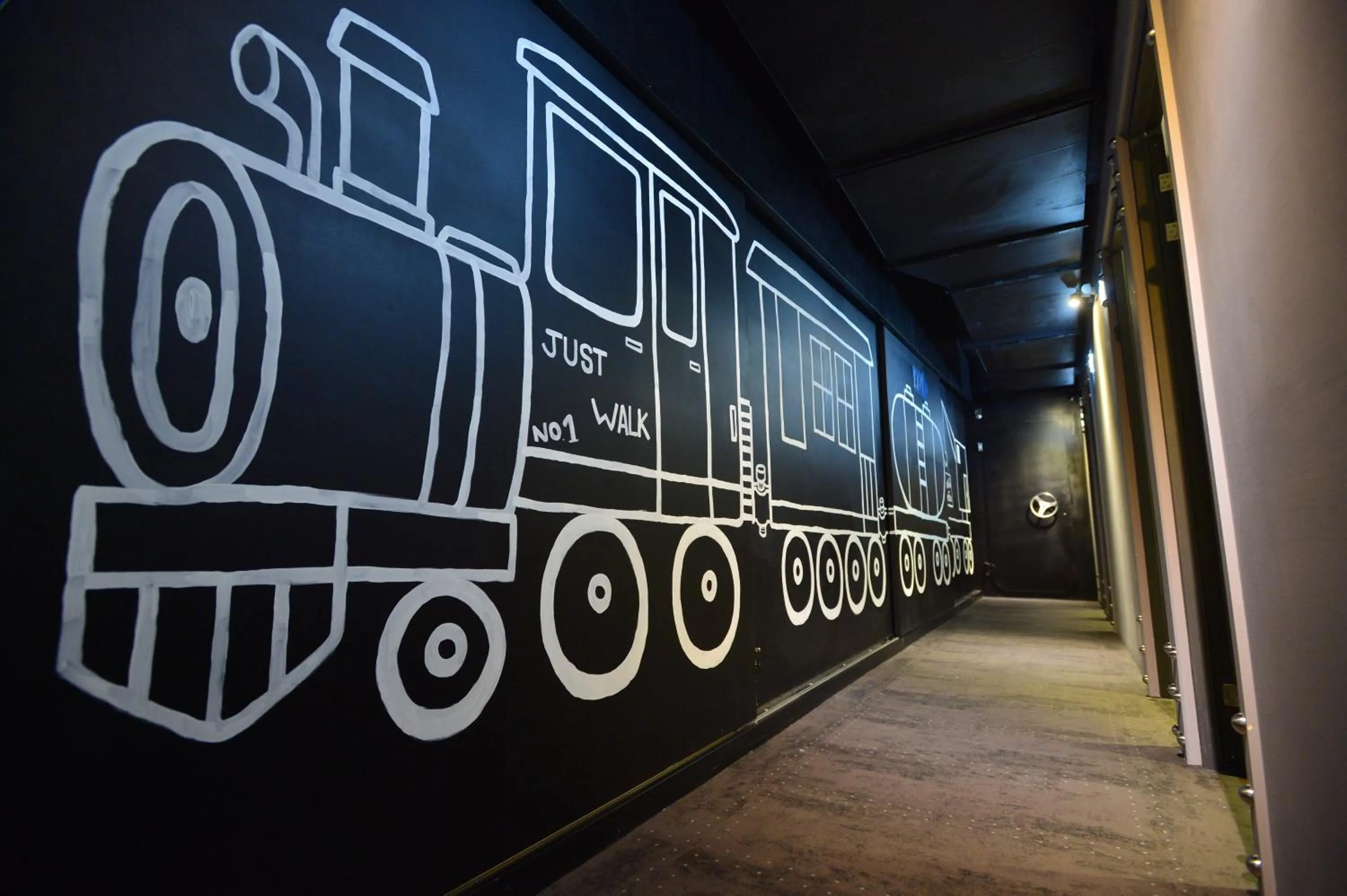 Property building in Just Walk Backpacker Hostel