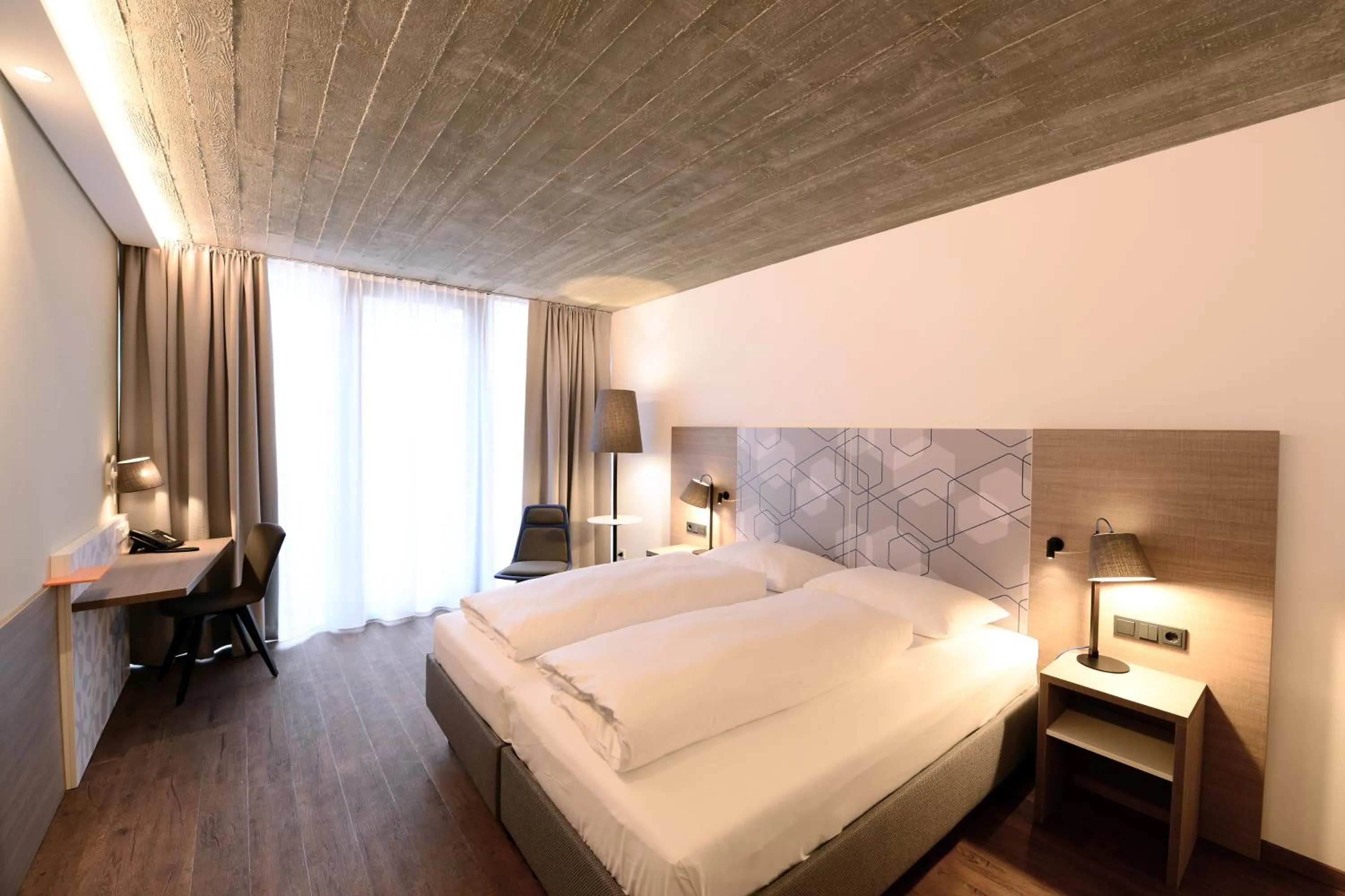 Photo of the whole room, Bed in arte Hotel Kufstein