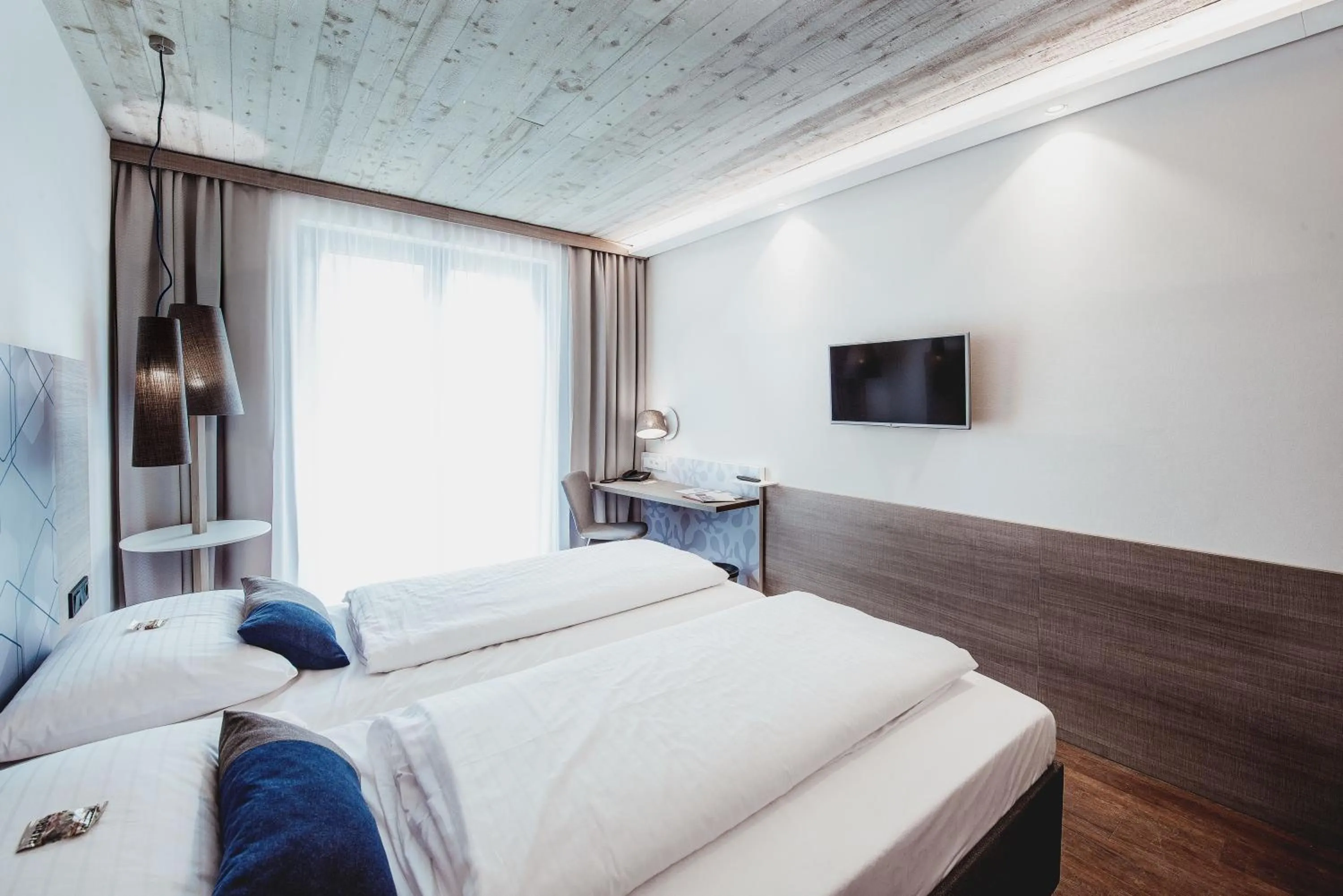 Photo of the whole room, Bed in arte Hotel Kufstein