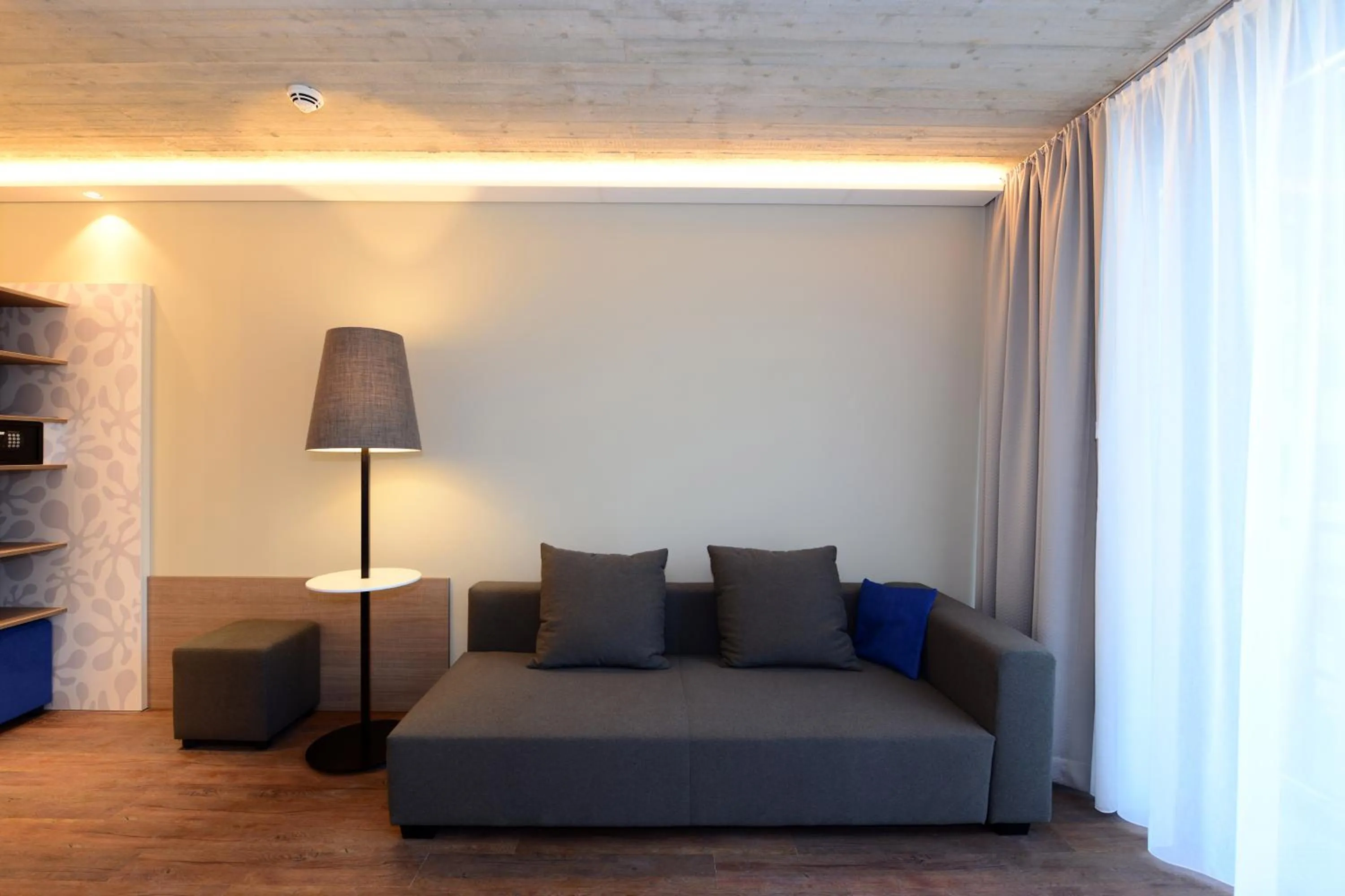 Seating area, Bed in arte Hotel Kufstein