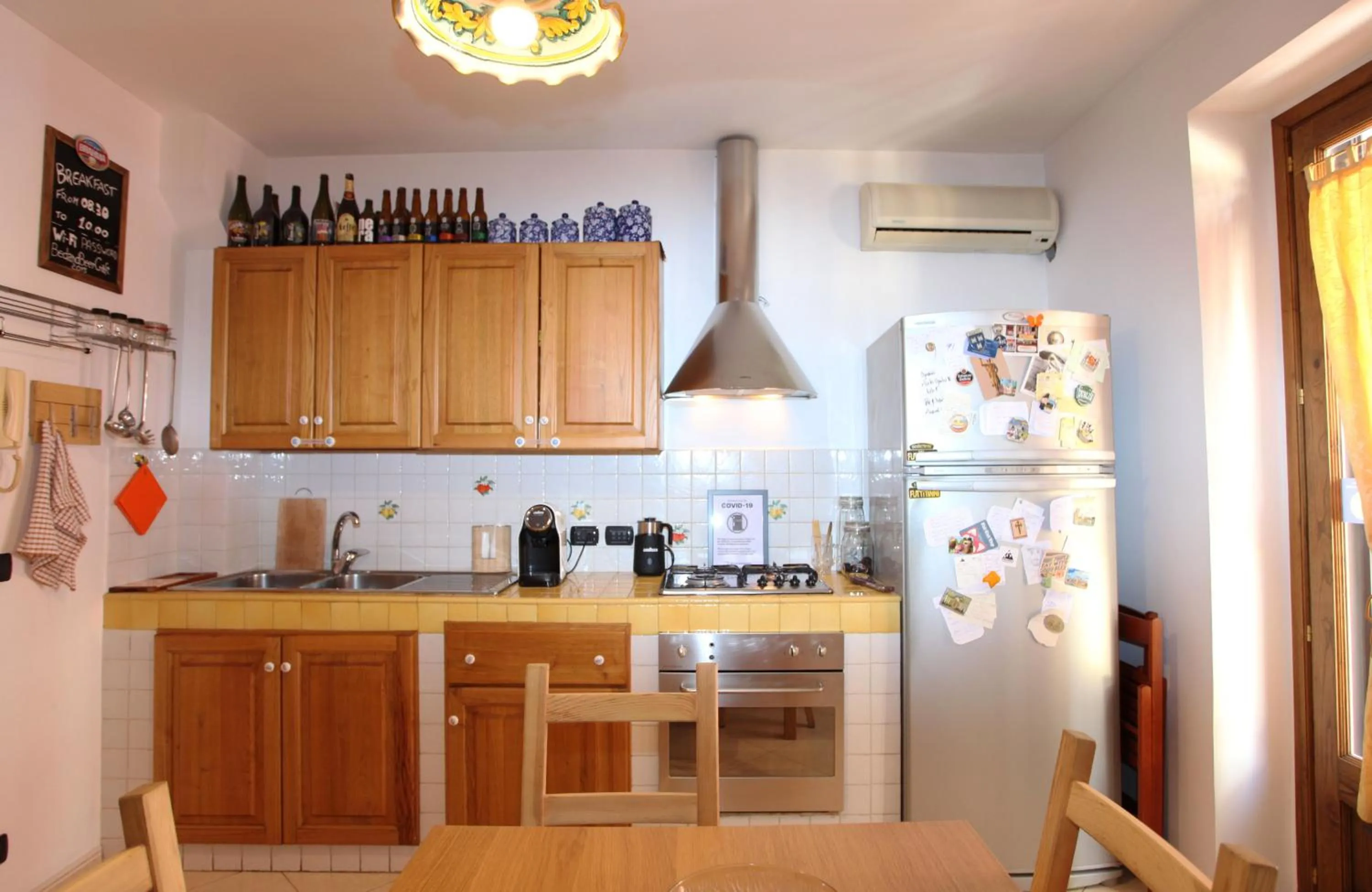 Kitchen or kitchenette in Taormina Bed and BeerCraft