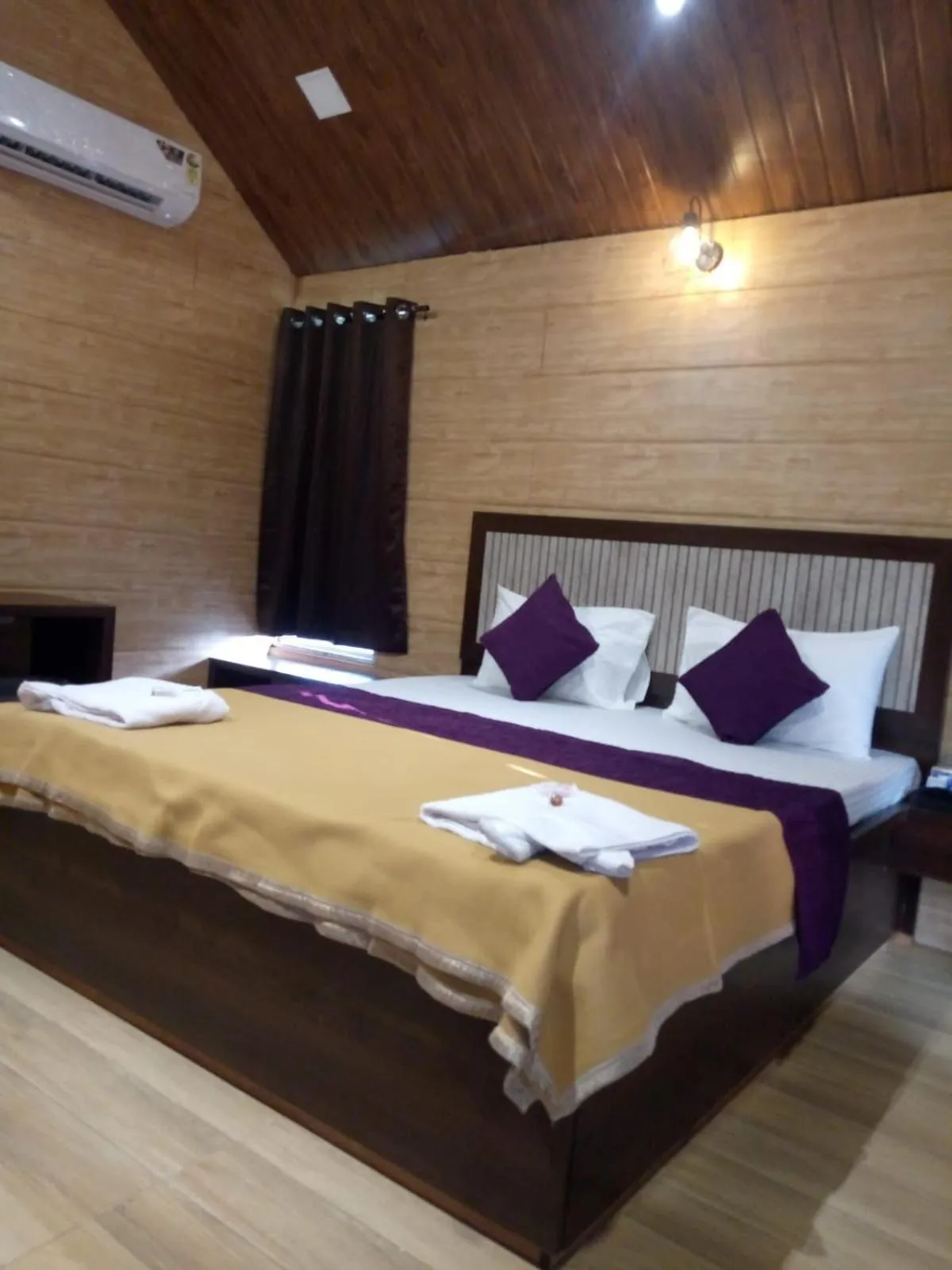 Bed in Whistling Waves Beach Resort