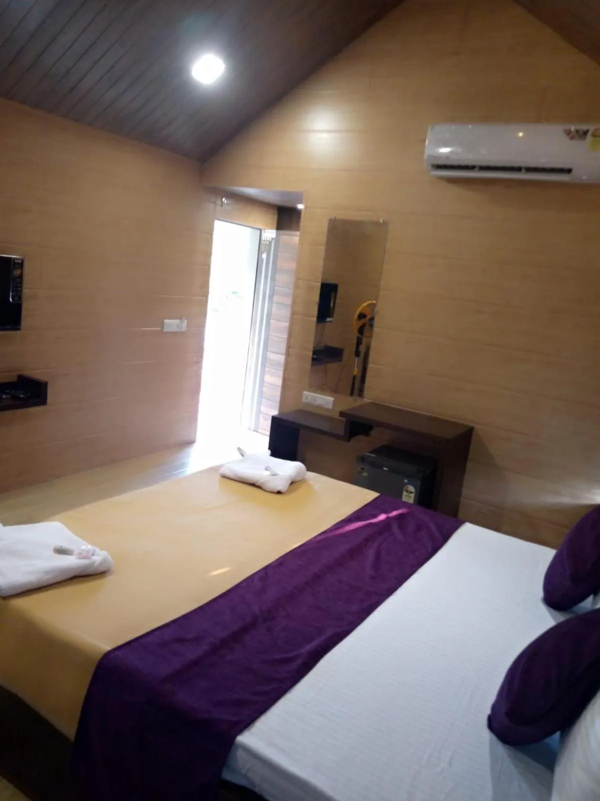 air conditioner, Bed in Whistling Waves Beach Resort