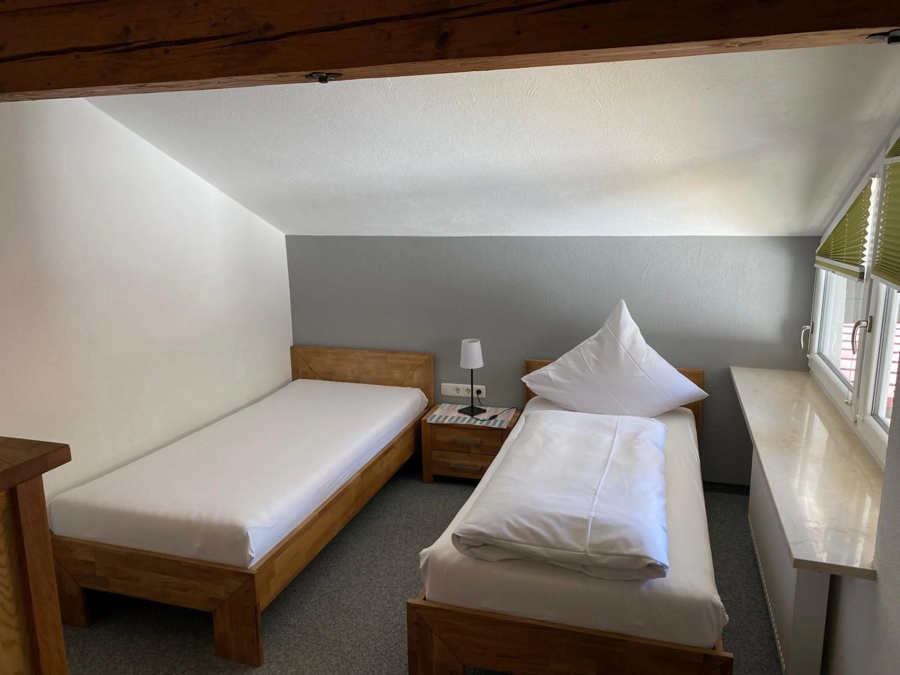 Bed in Bergsteiger-Hotel "Grüner Hut"