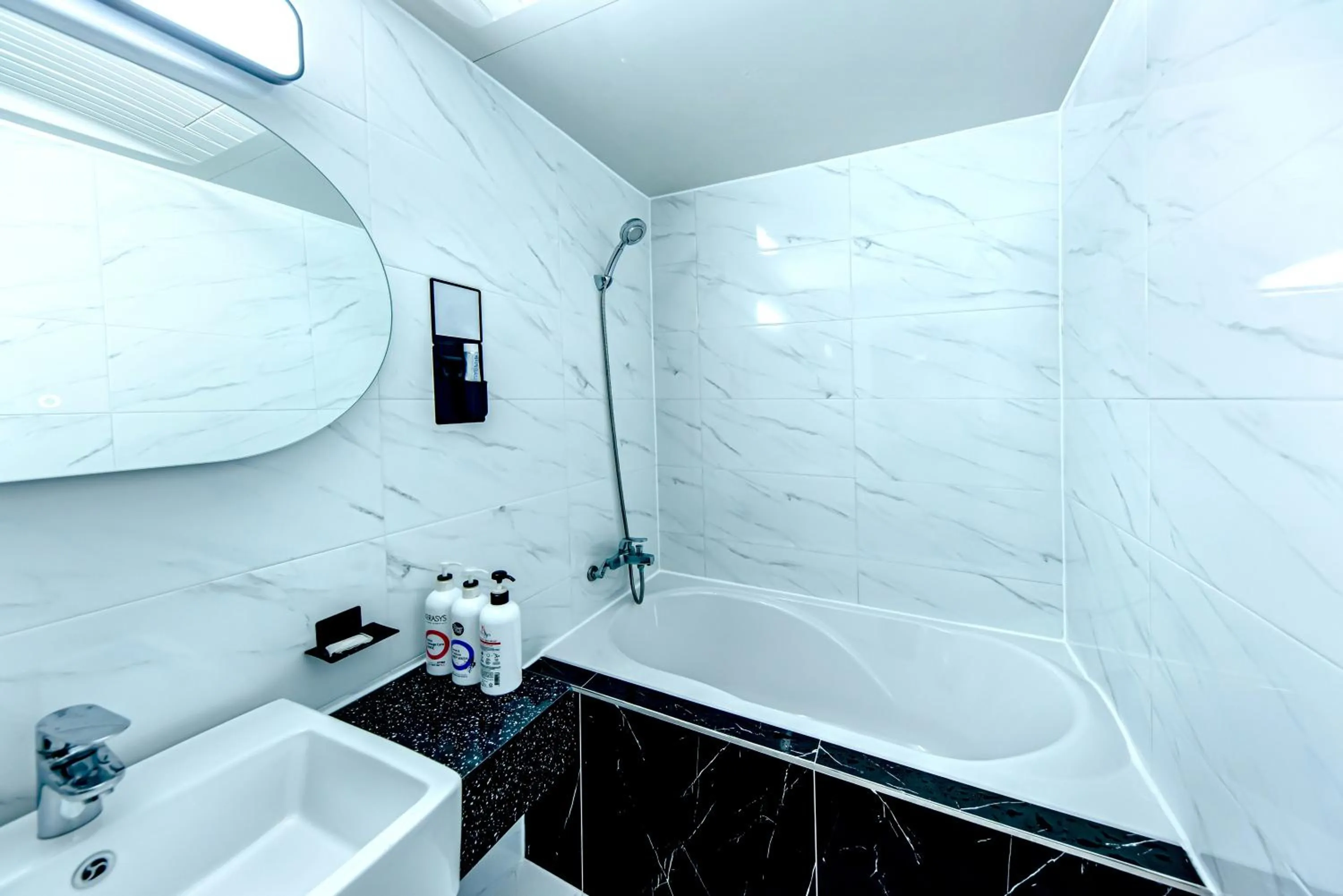 Bathroom in HS Tourist Hotel