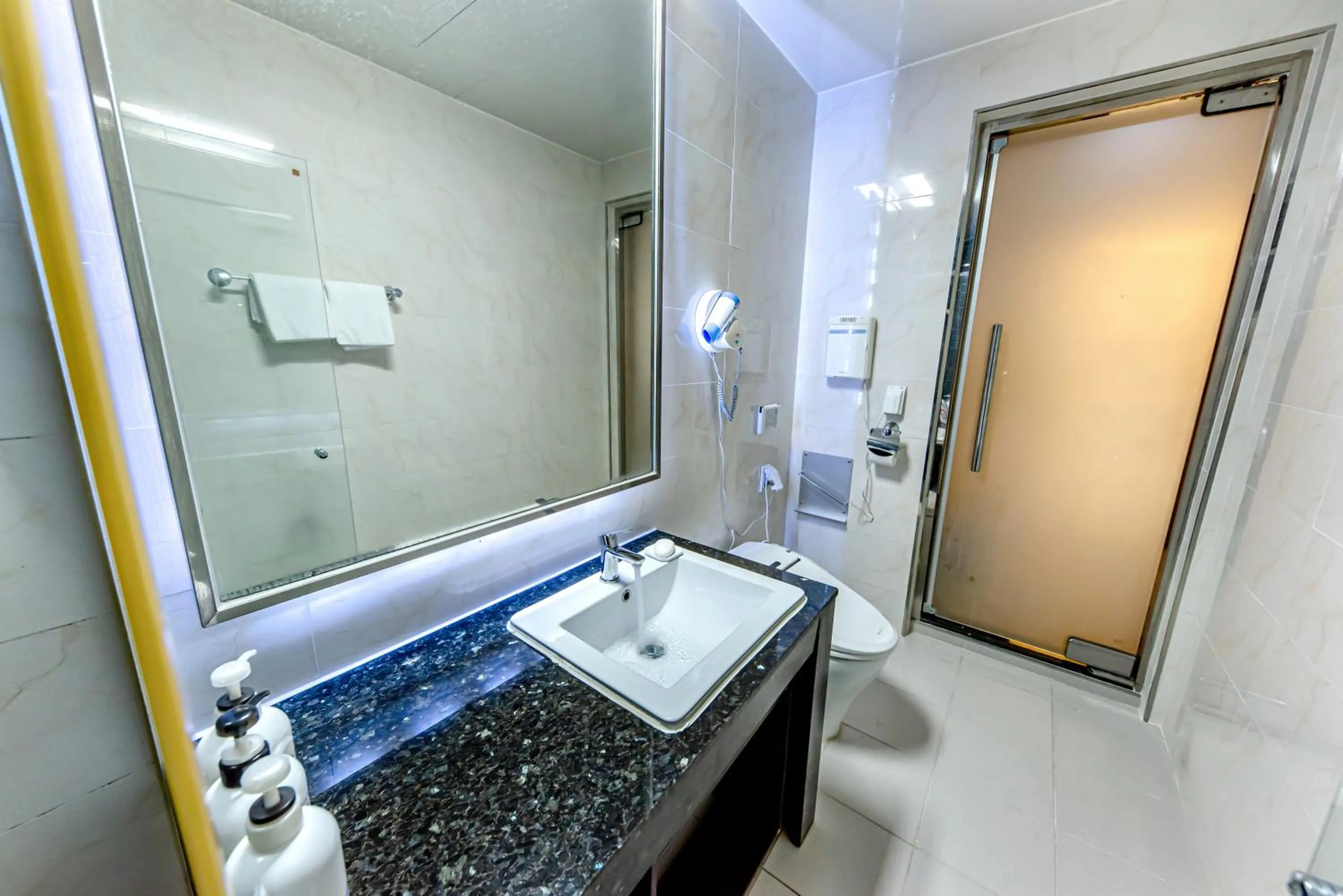 Bathroom in HS Tourist Hotel