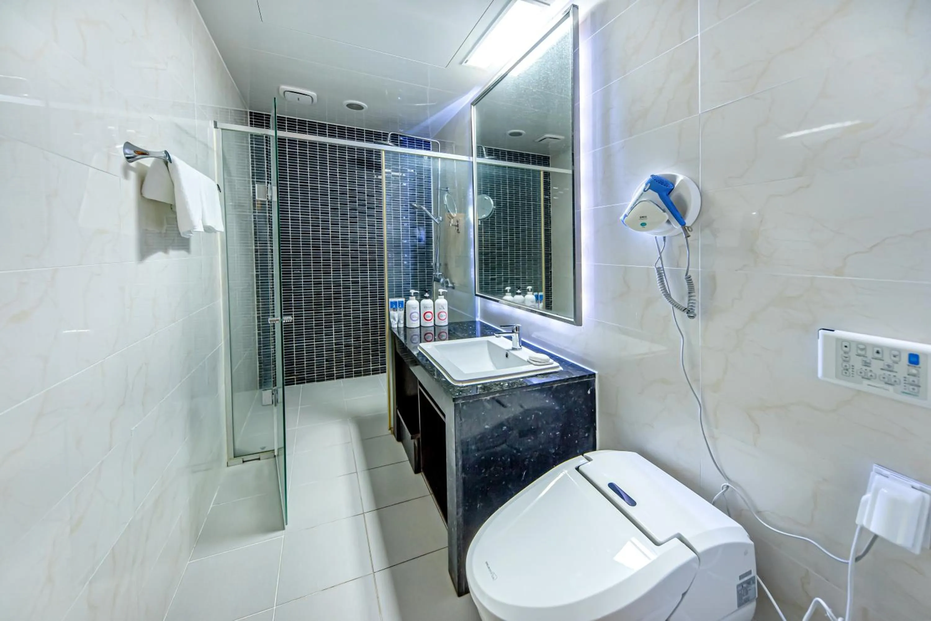 Bathroom in HS Tourist Hotel