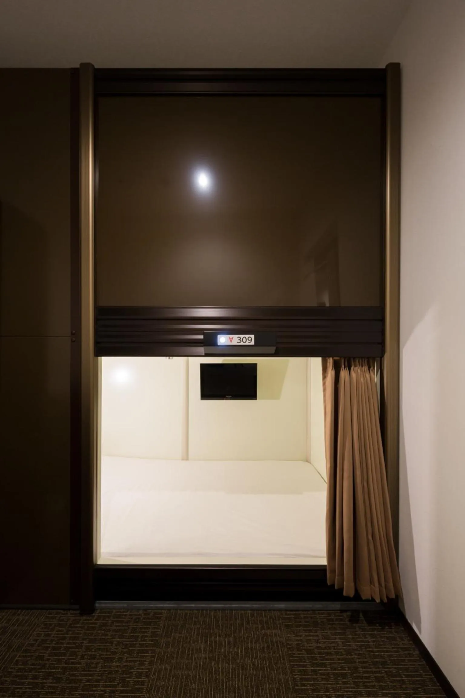 Bed in Capsule Hotel Cube Hiroshima