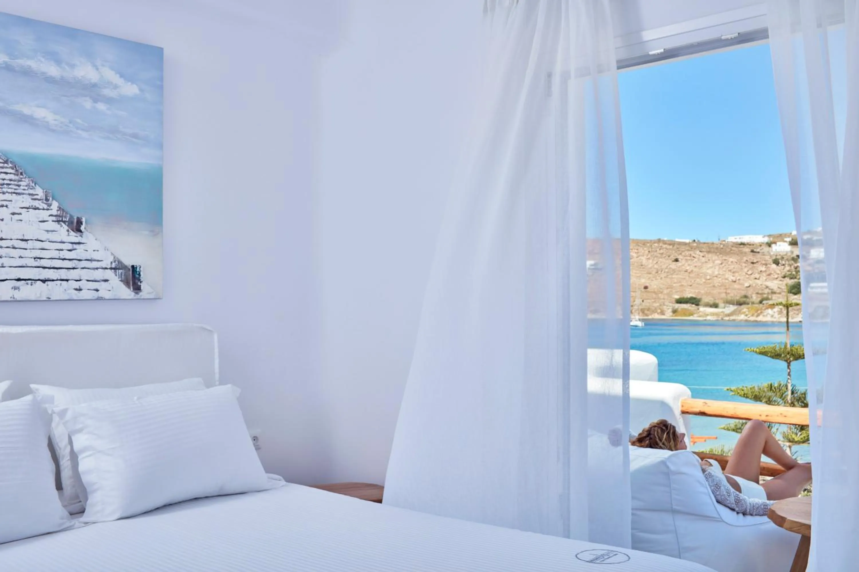 Photo of the whole room, Bed in Mykonos Waves Beach House & Suites