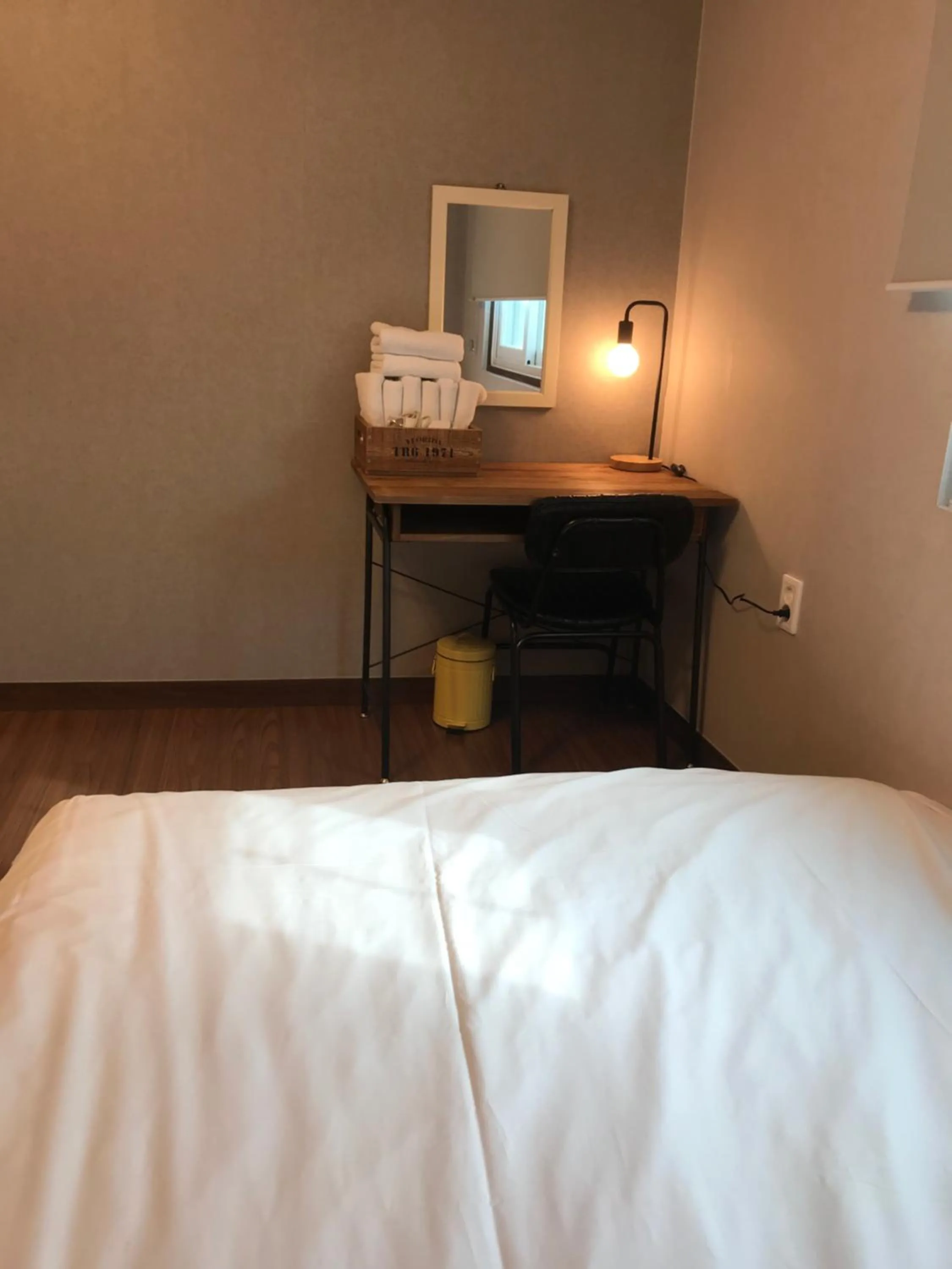 Bed in Grim Garden Guesthouse