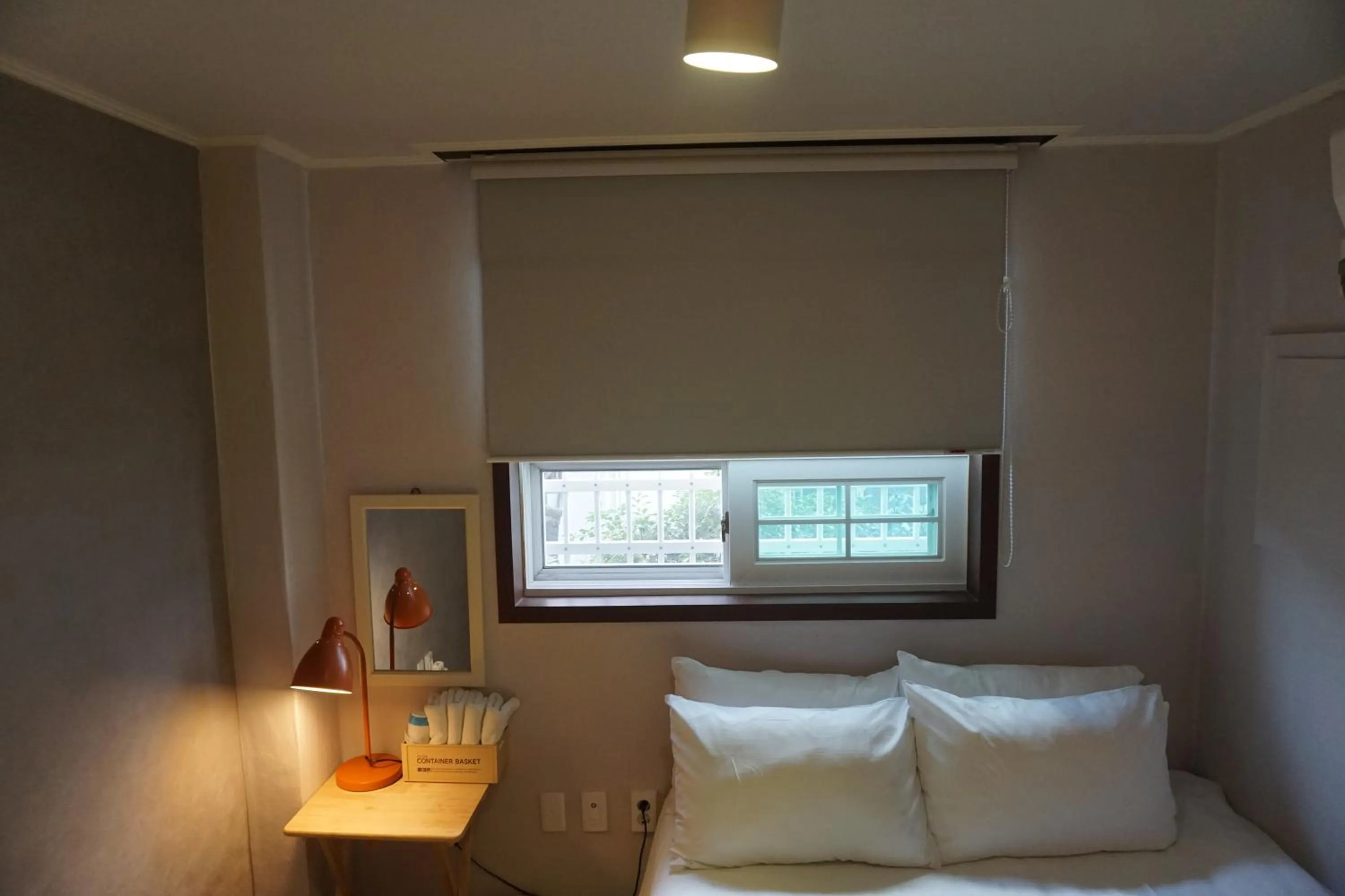 Decorative detail, Bed in Grim Garden Guesthouse