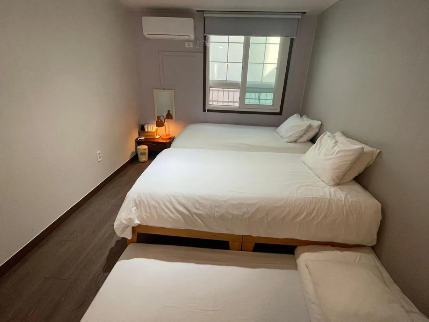 Bed in Grim Garden Guesthouse