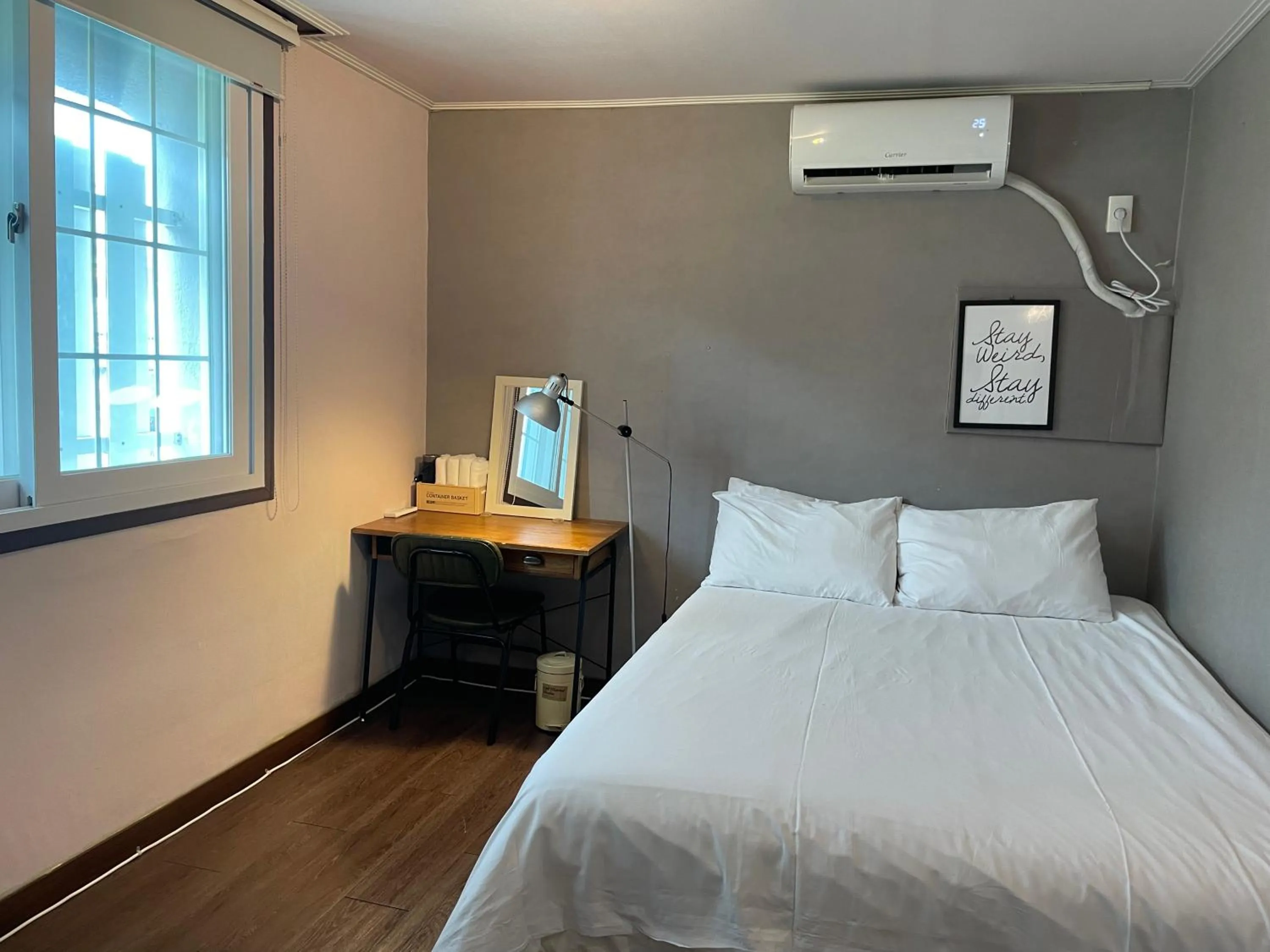 Bed in Grim Garden Guesthouse