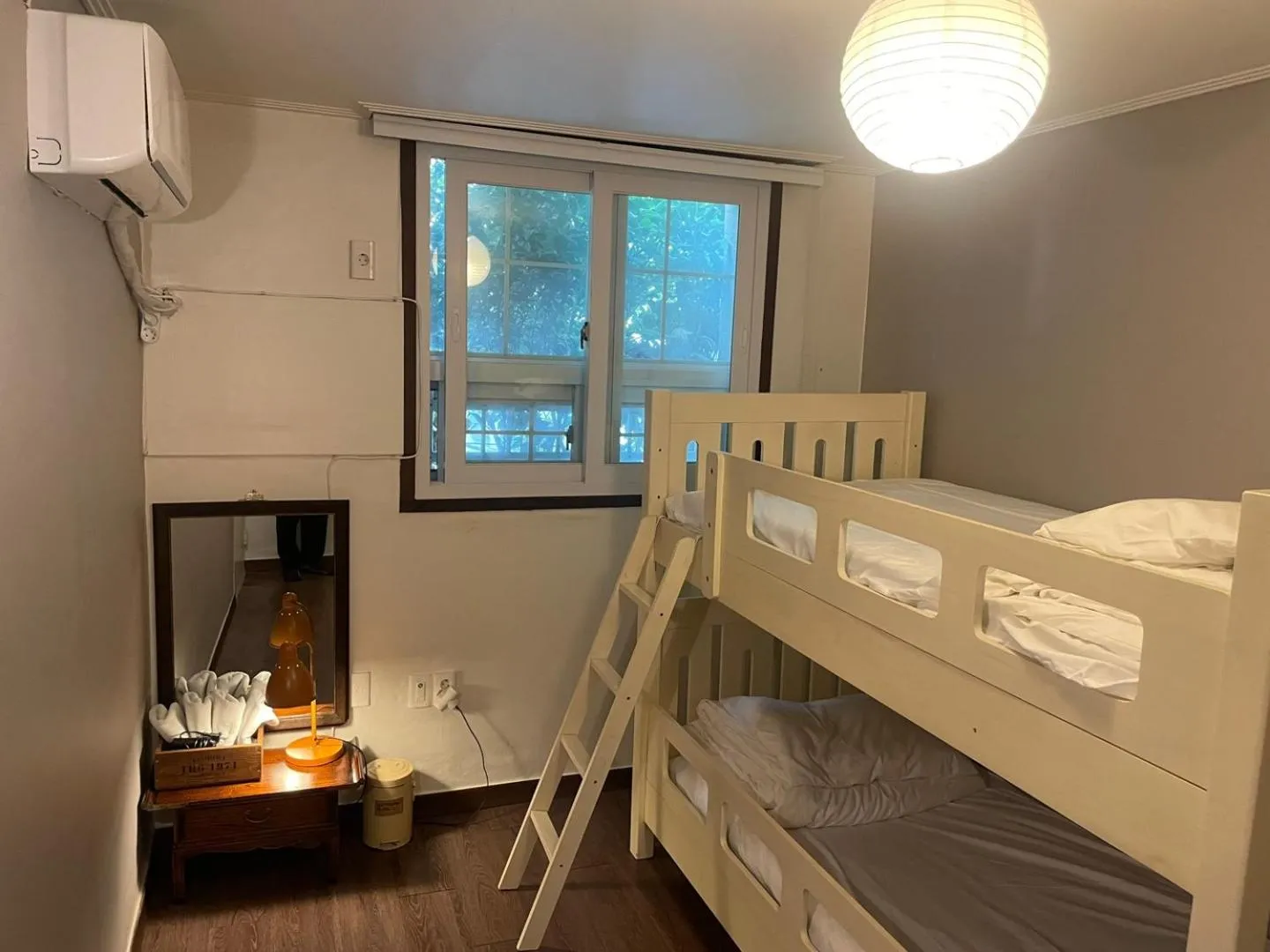 Bed in Grim Garden Guesthouse