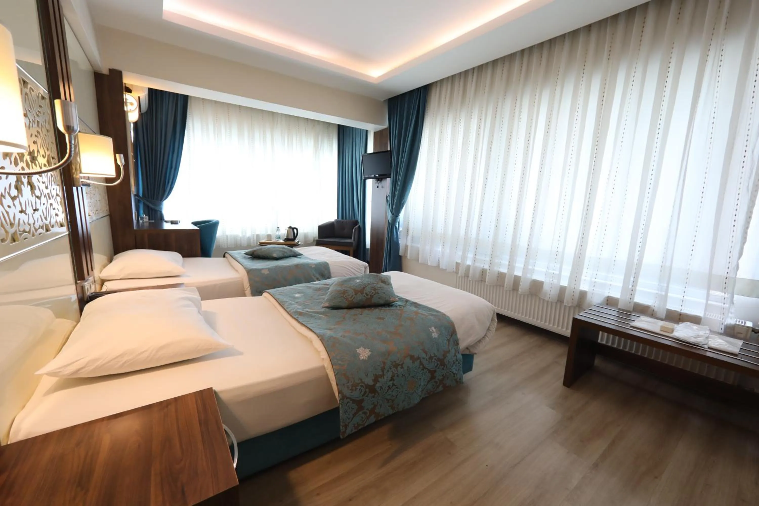 Bed in Rest Inn Aydın Hotel