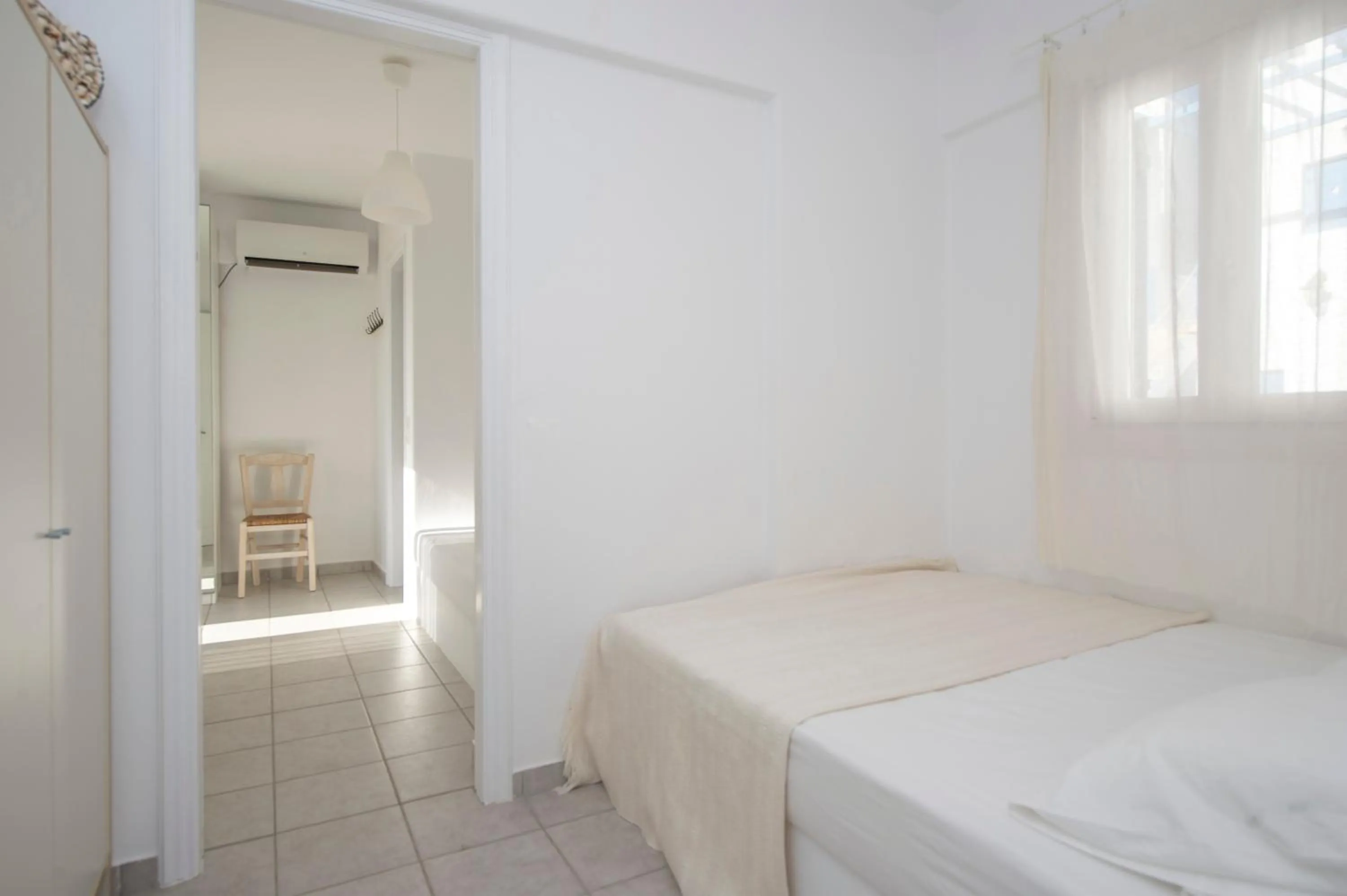 Bedroom, Bed in Cleopatra Seaside Homes, Logaras, Paros