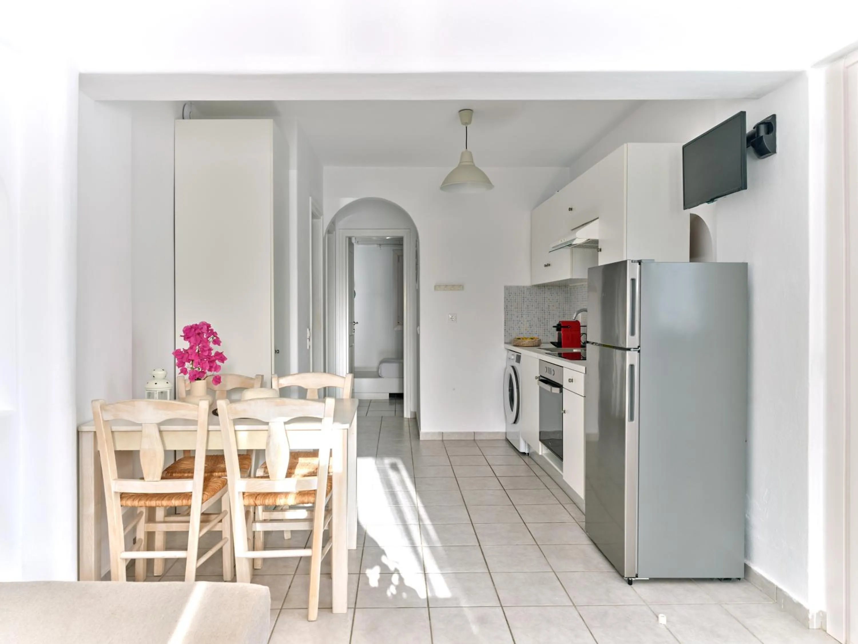 Dining area in Cleopatra Seaside Homes, Logaras, Paros
