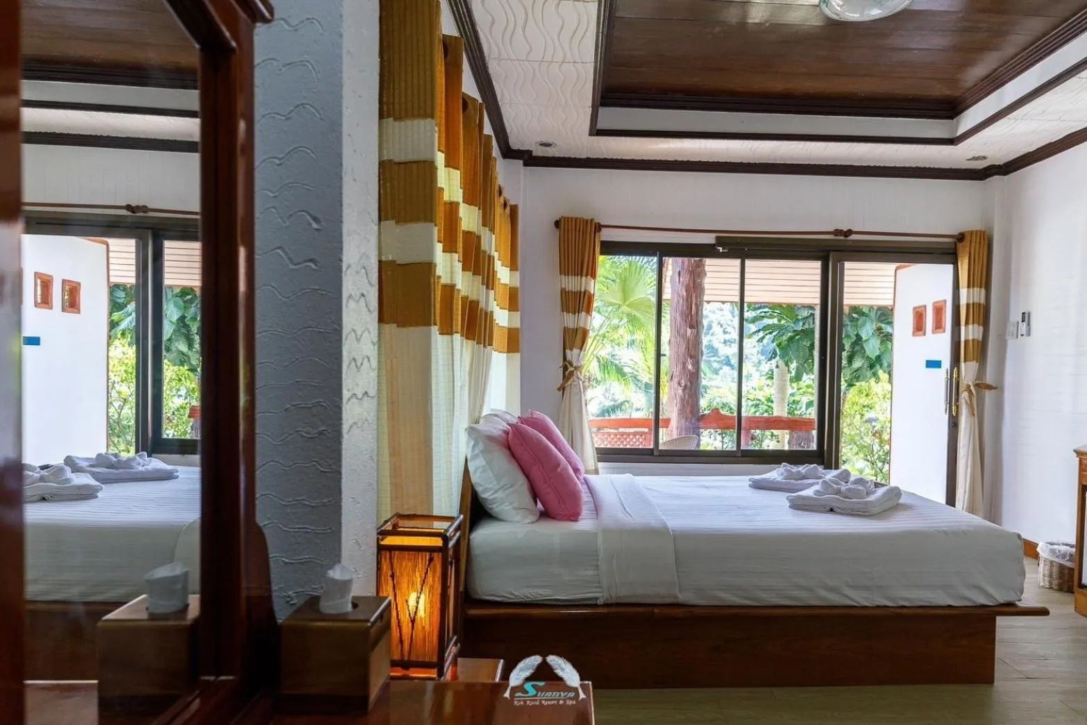 Bed in Suanya Kohkood Resort and Spa