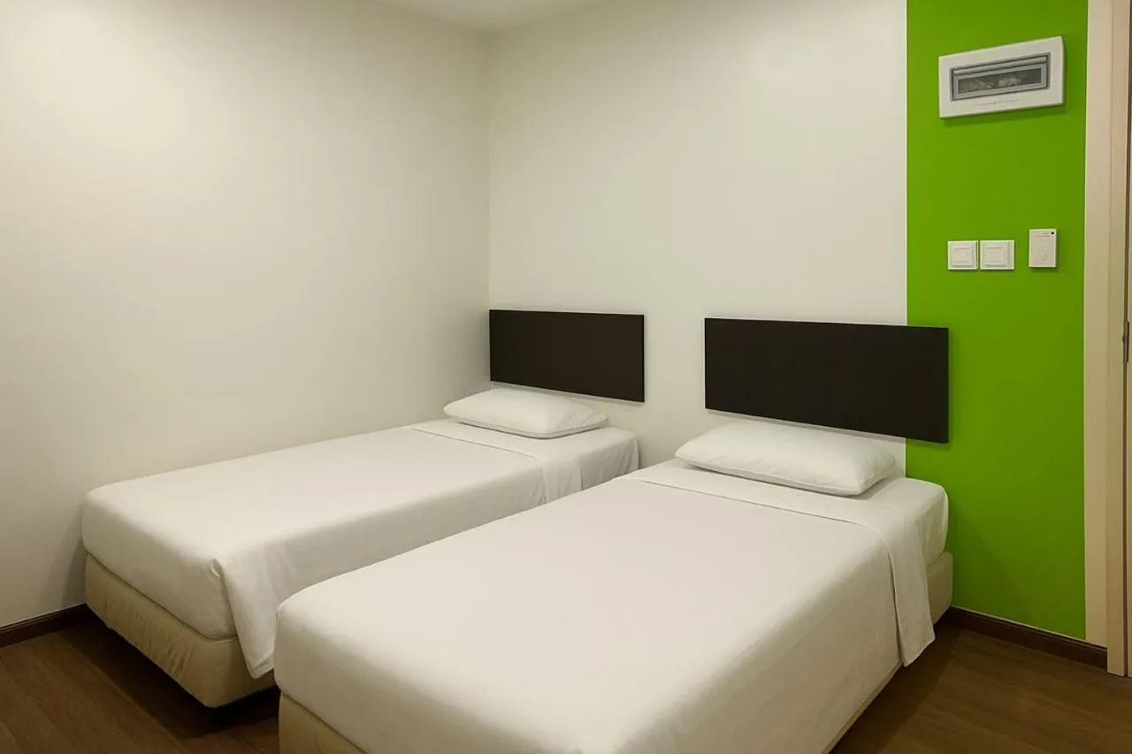 Bed in Apple Inn Hotel