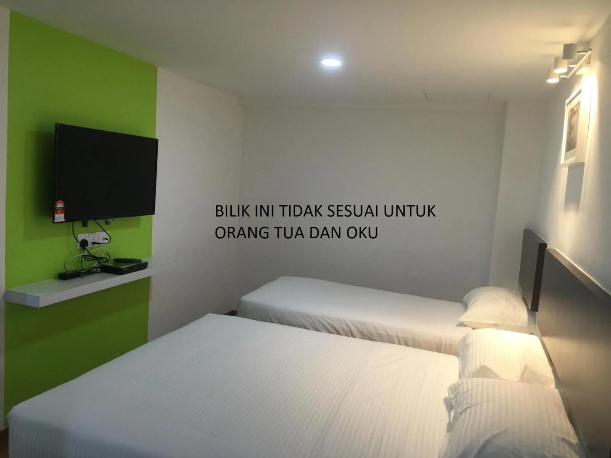 Bed in Apple Inn Hotel