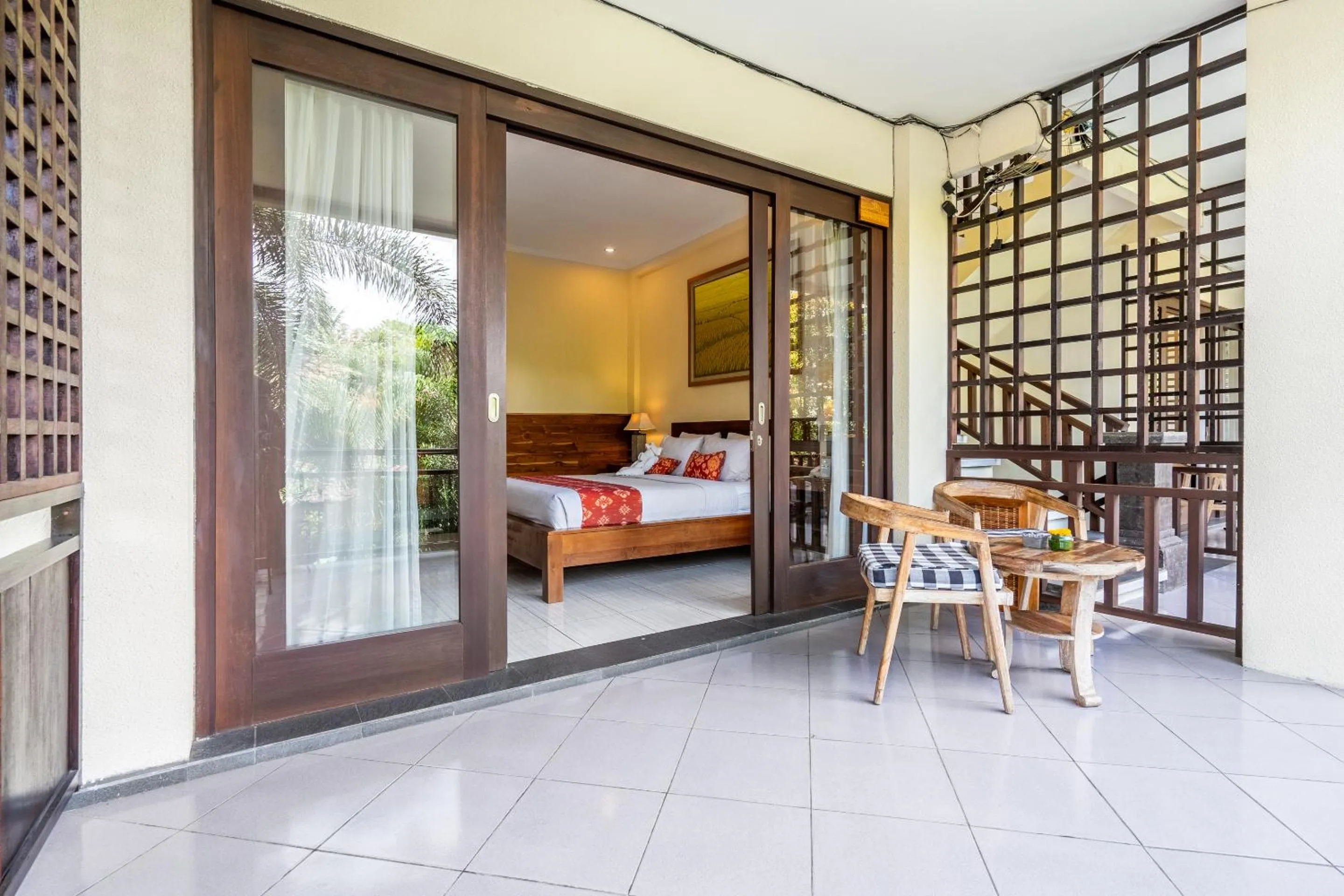Seating area, Bed in Meruhdani Boutique Hotel Ubud
