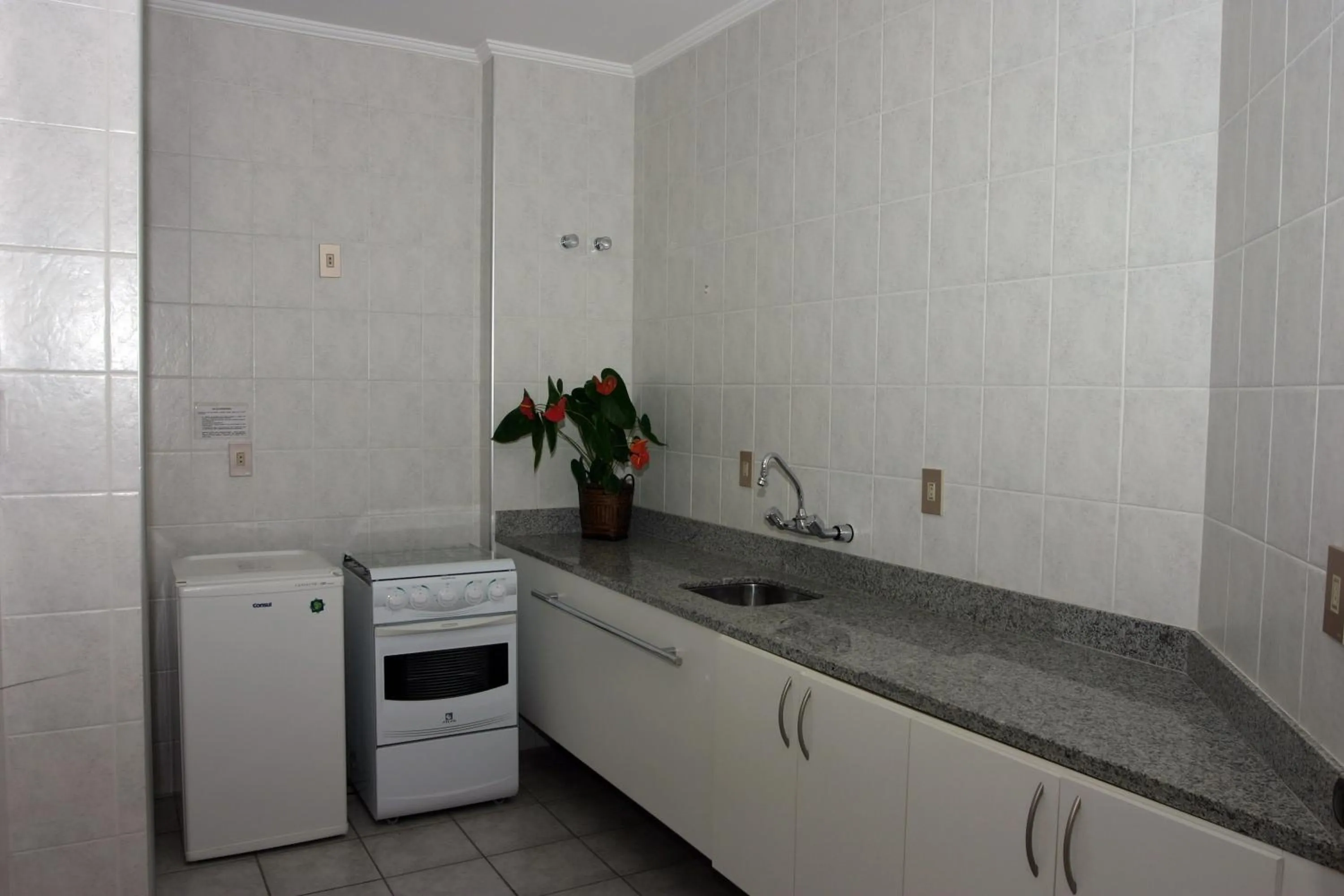 Kitchen or kitchenette in Lagoa Serena Flat Hotel