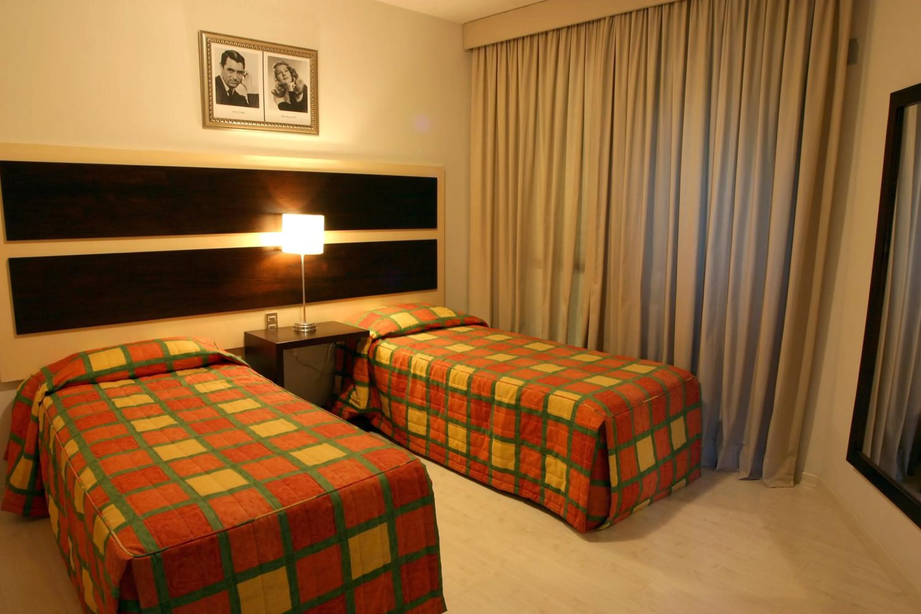 Bed in Lagoa Serena Flat Hotel