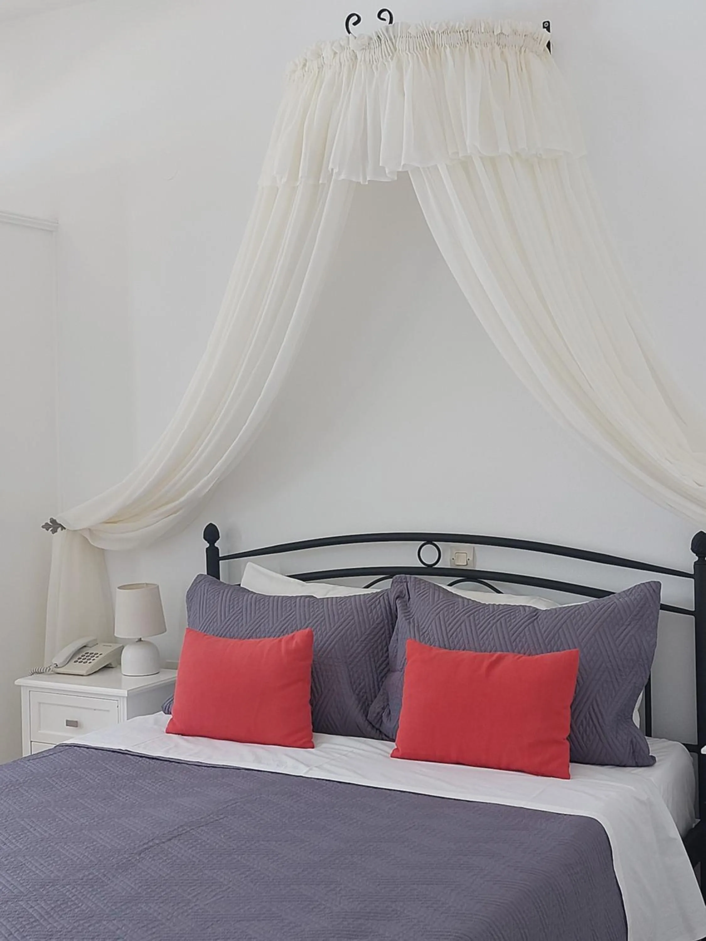 Bed in Anthonas Apartments