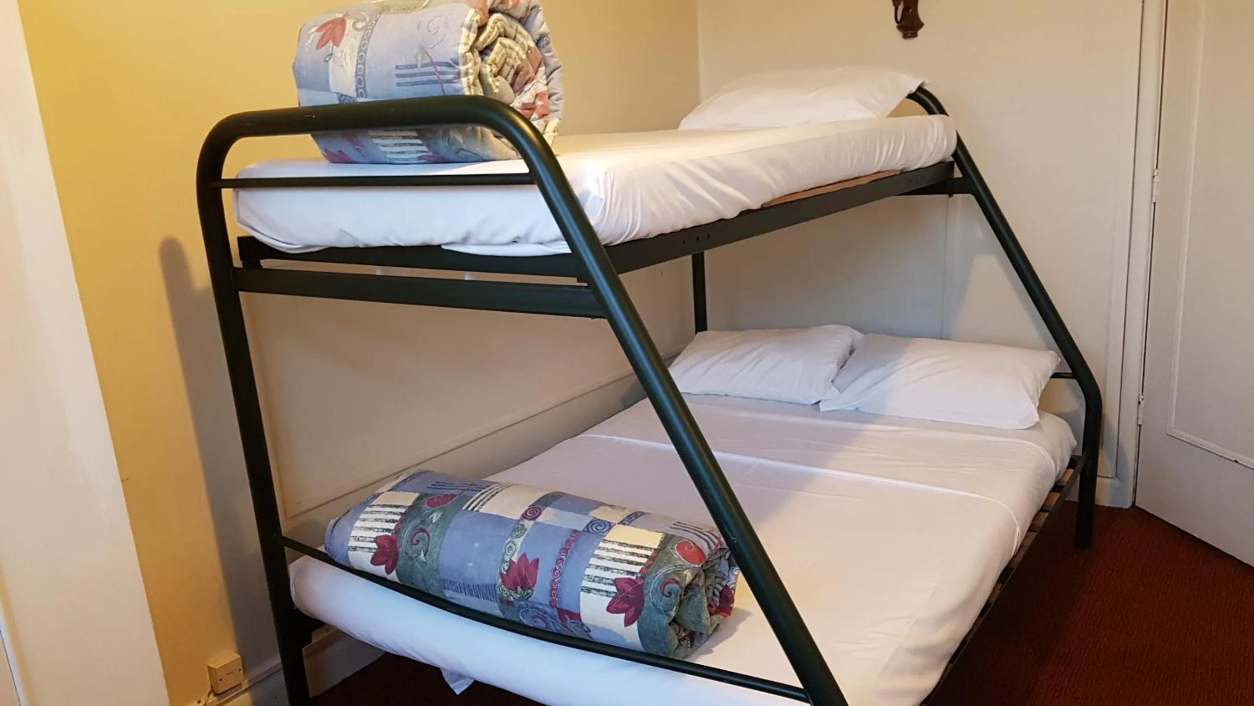 Bed in Whakatane Hotel