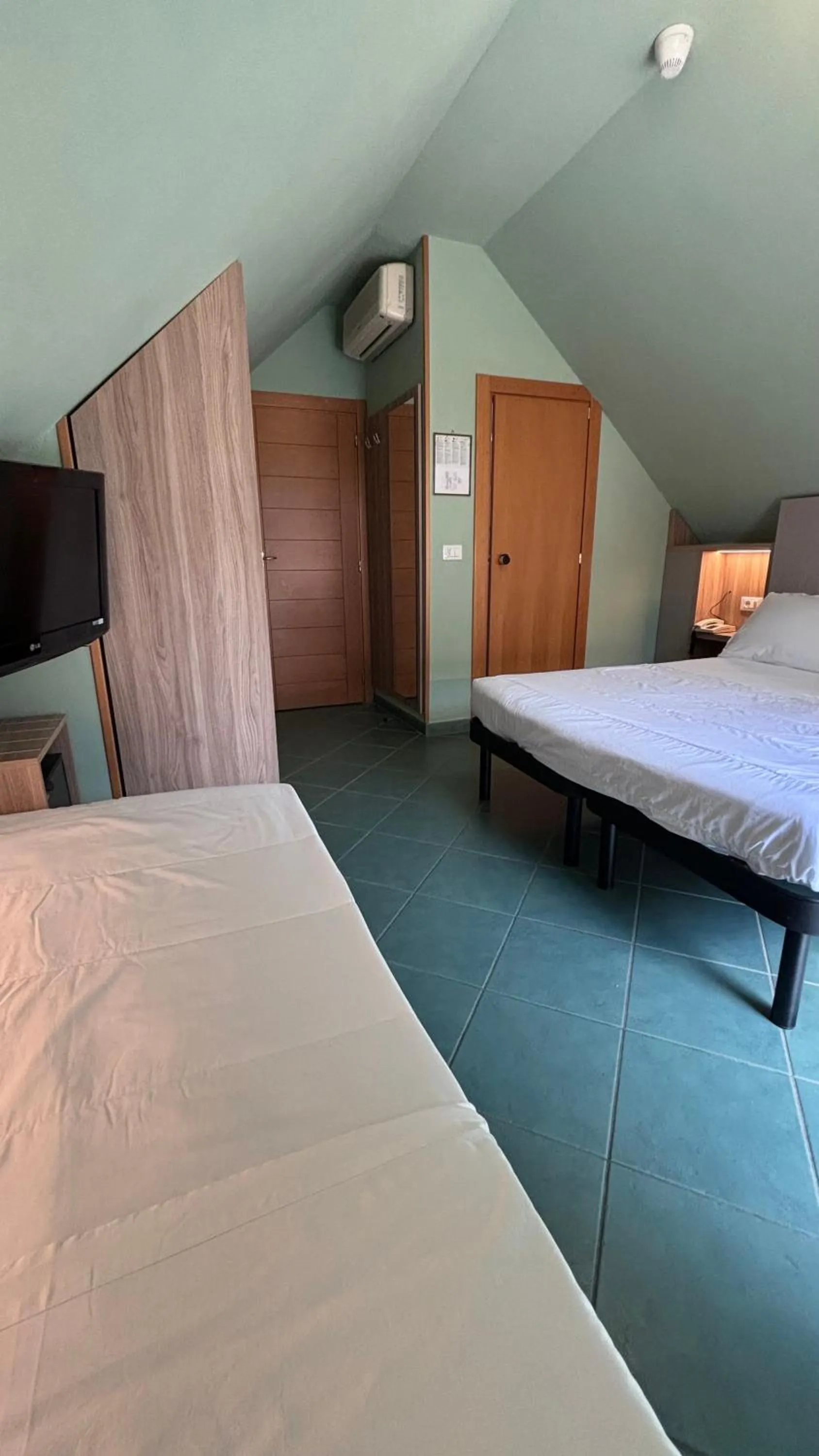 Photo of the whole room, Bed in Pinetina Mare Baby Family Hotel