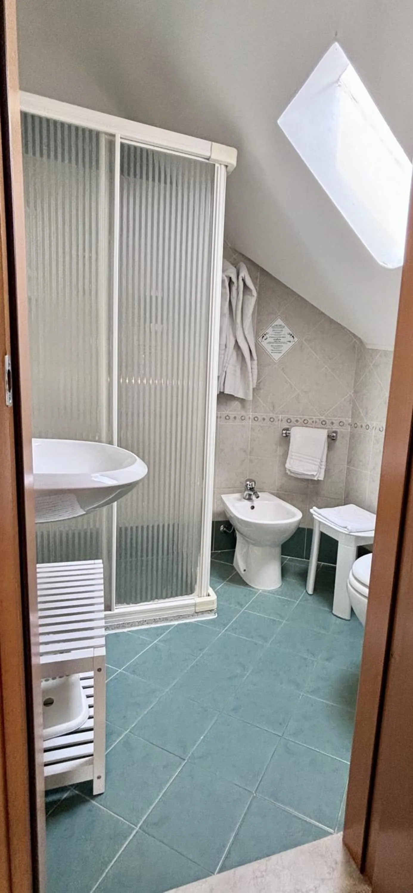 Bathroom in Pinetina Mare Baby Family Hotel