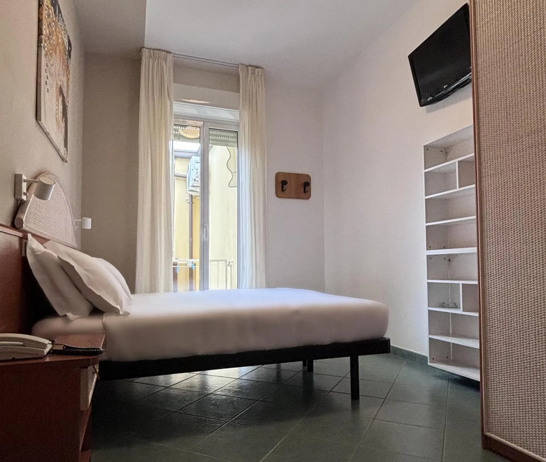 Bed in Pinetina Mare Baby Family Hotel