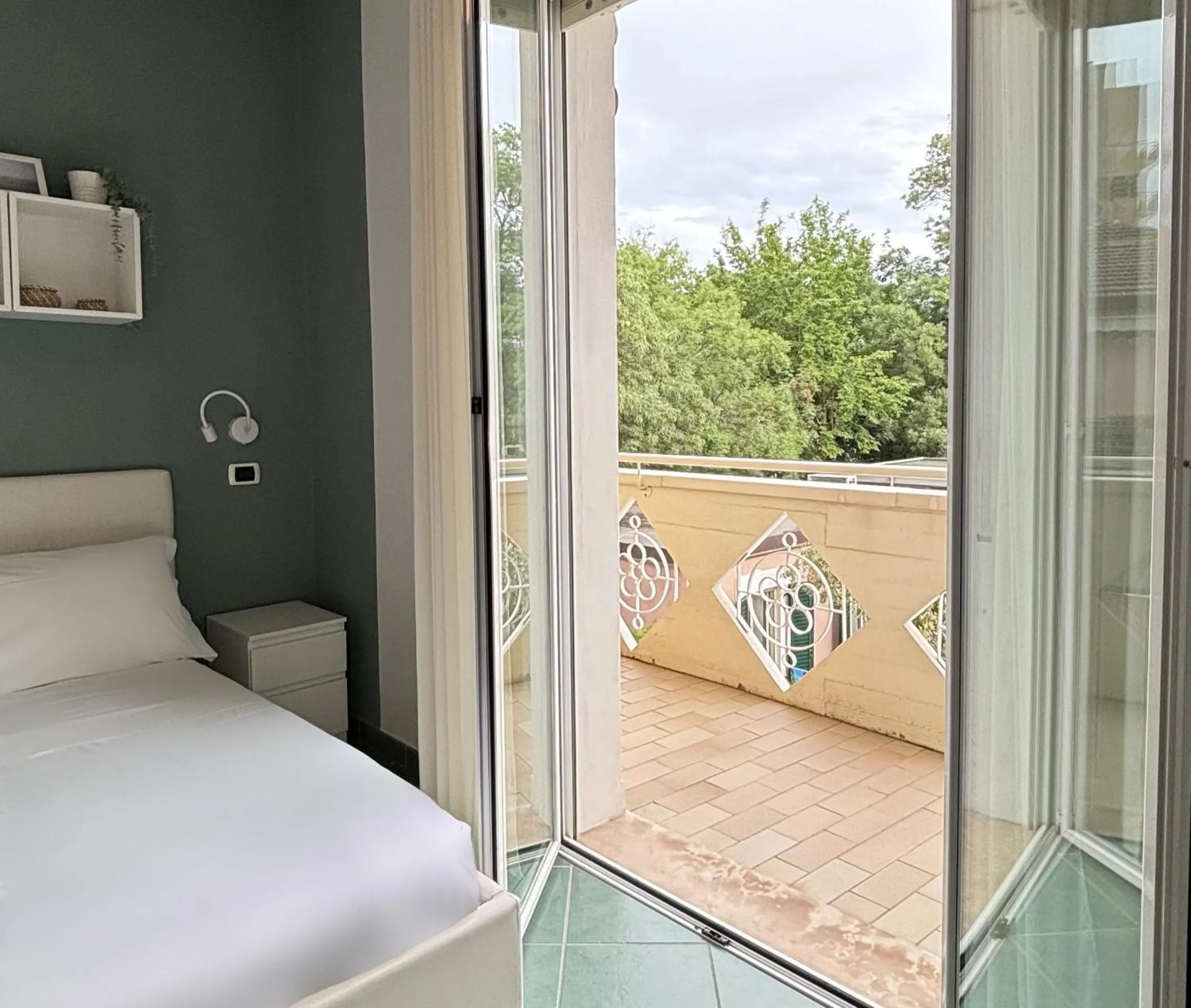 Bed in Pinetina Mare Baby Family Hotel