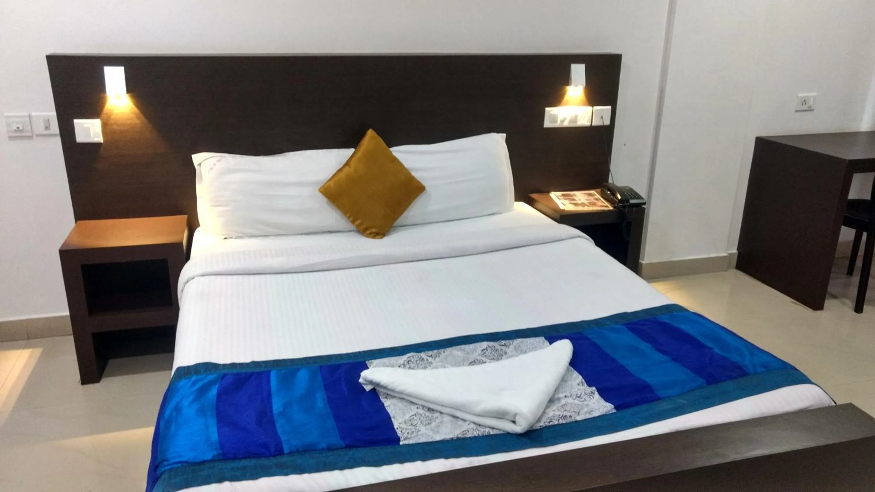 Bed in Half Moon Residency Calicut