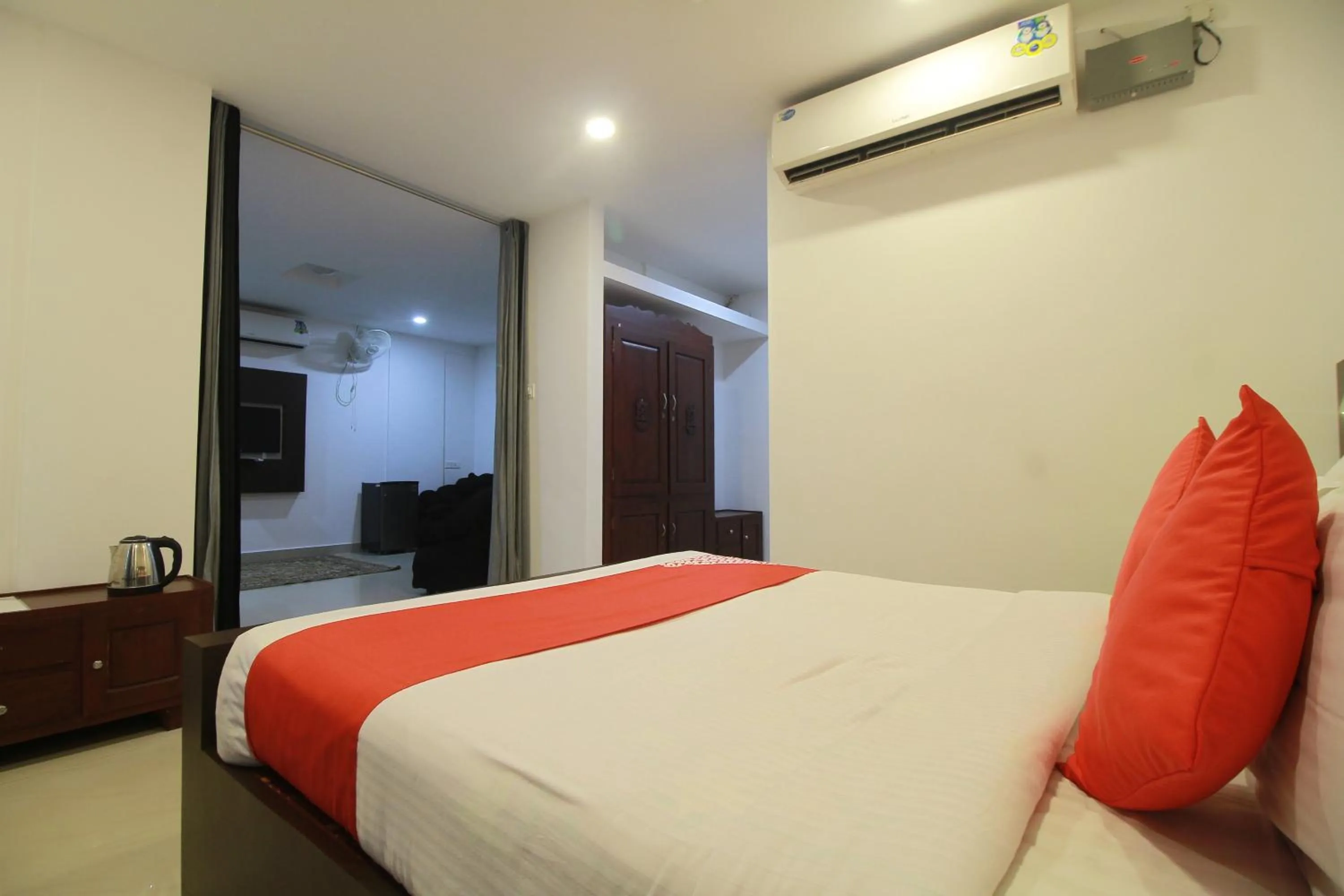 Bed in Half Moon Residency Calicut