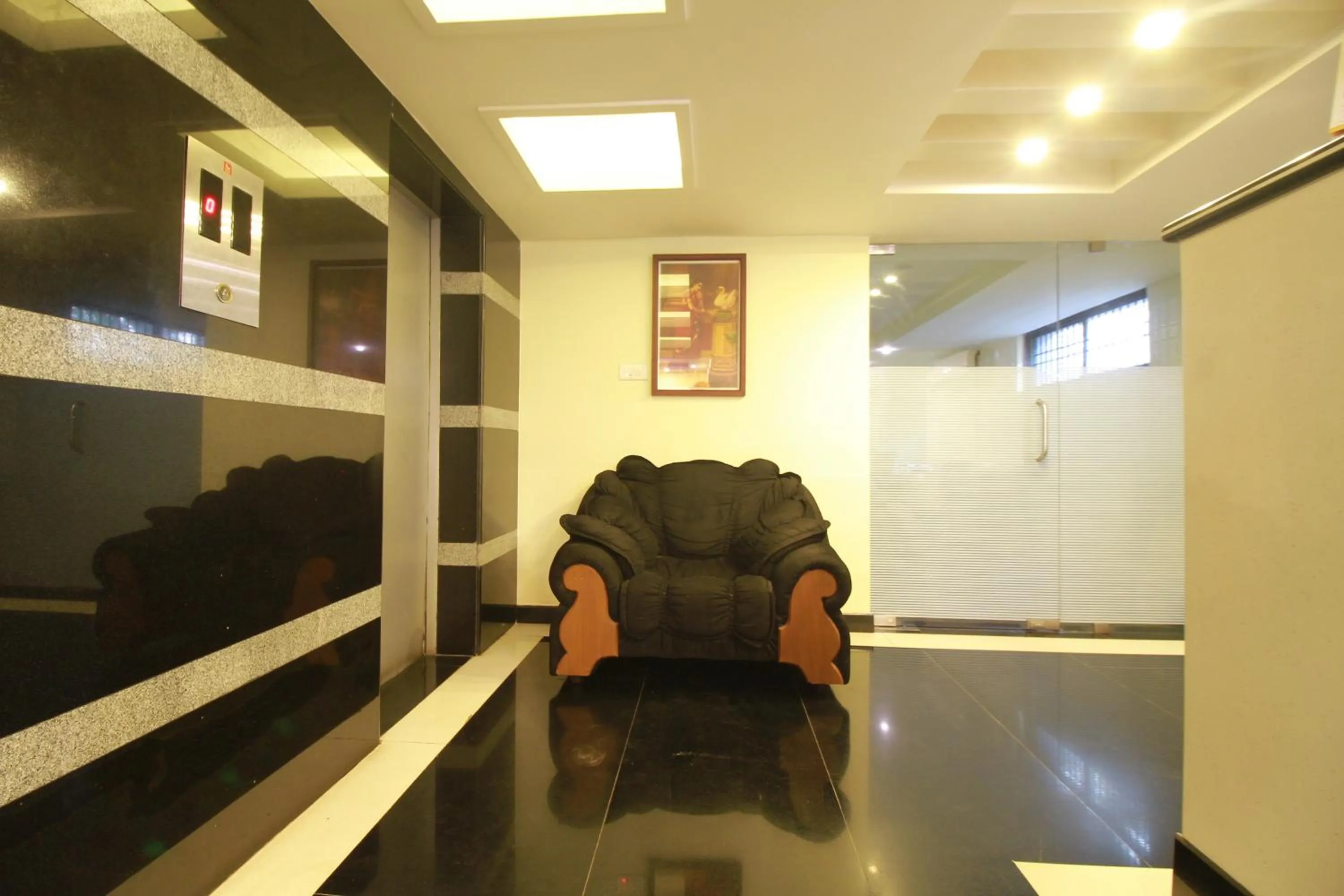 Lobby or reception in Half Moon Residency Calicut
