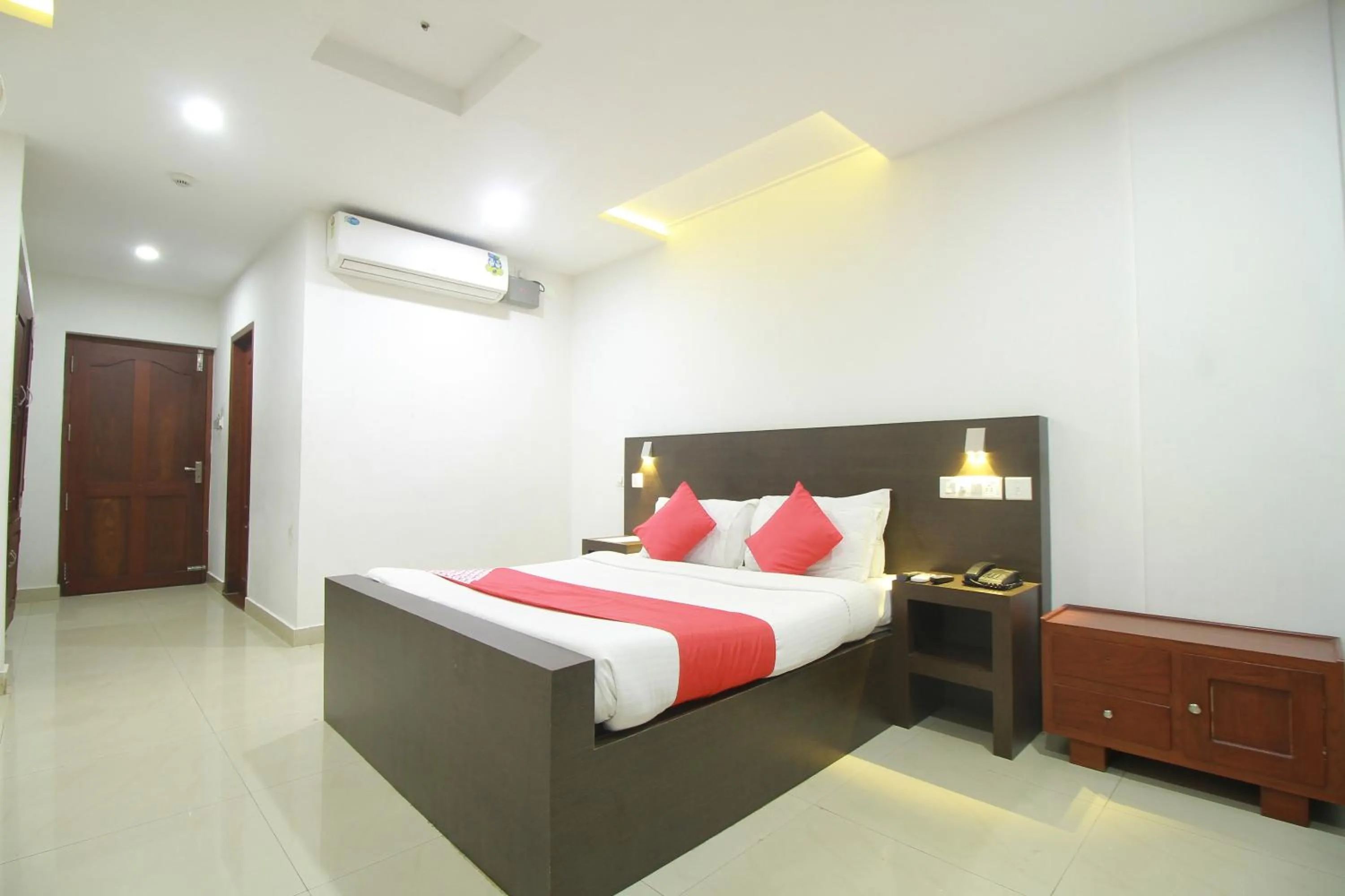 Bed in Half Moon Residency Calicut