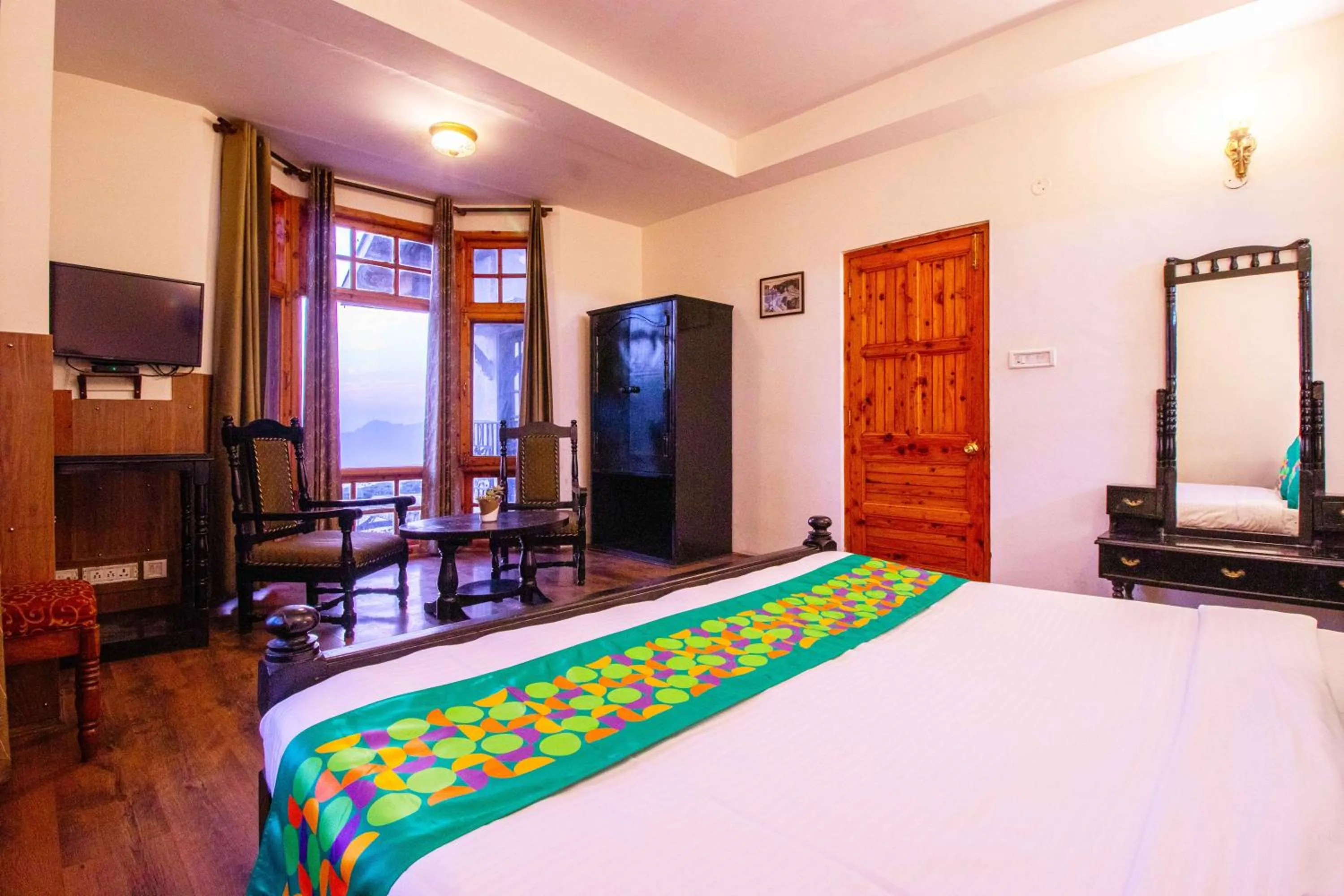 Bedroom, Bed in Treebo The Alpine Heritage Residency