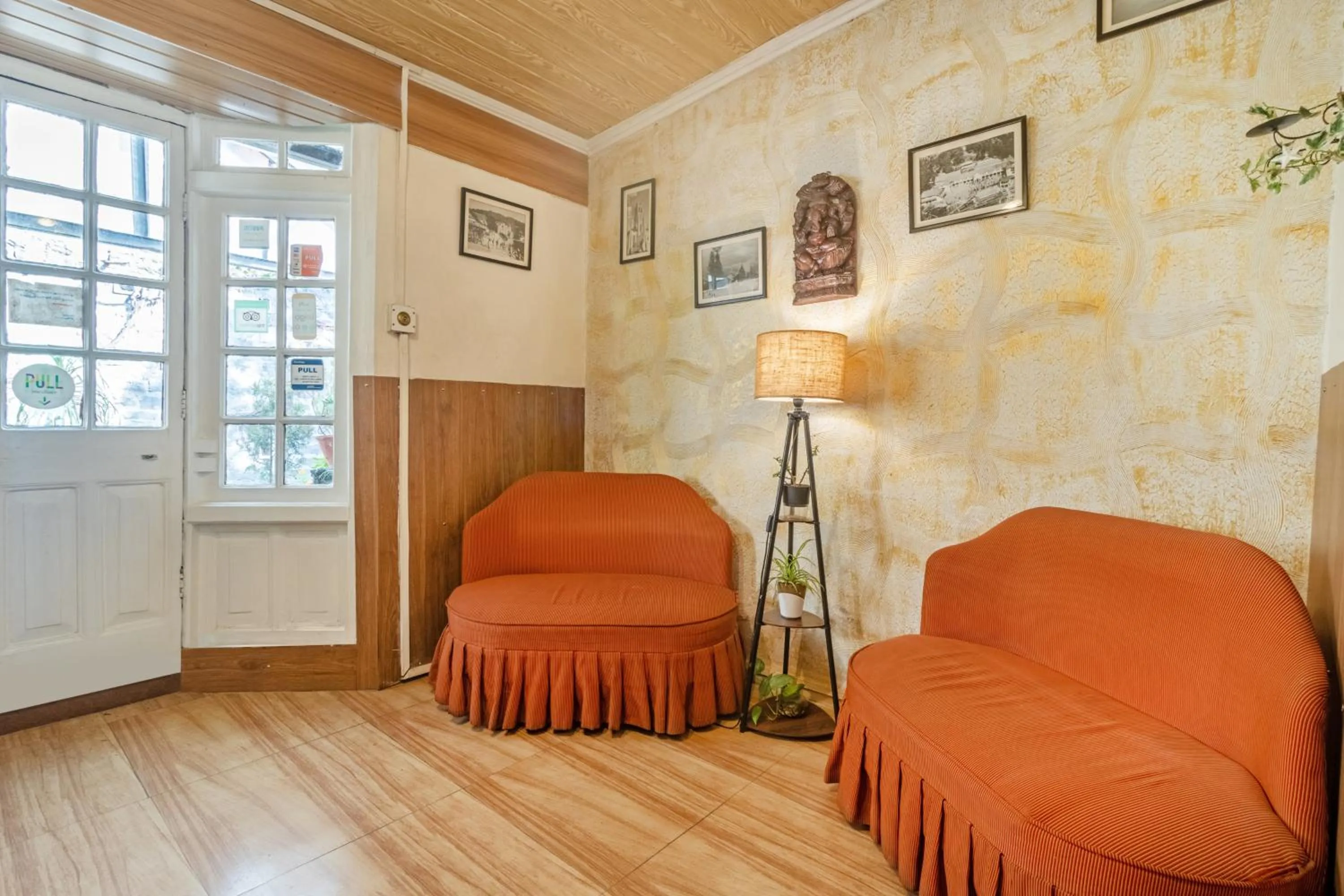Seating area in Treebo The Alpine Heritage Residency