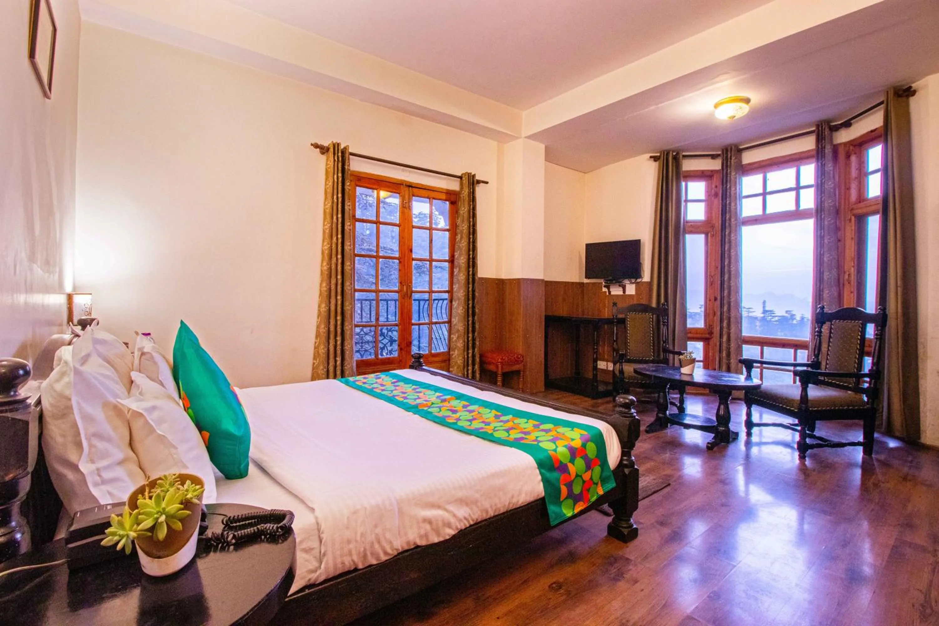 Bedroom, Bed in Treebo The Alpine Heritage Residency