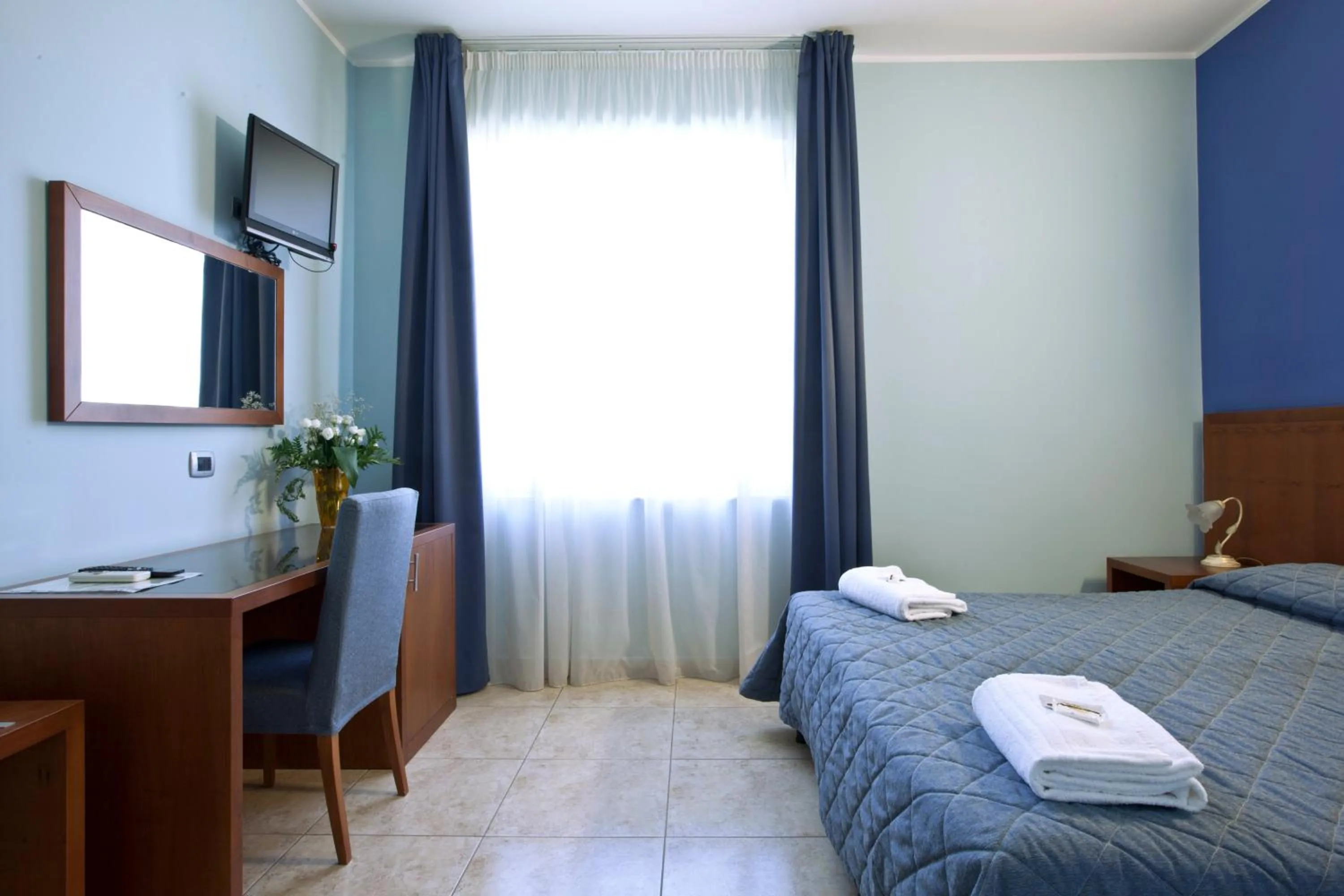 Bedroom in Hotel San Martino