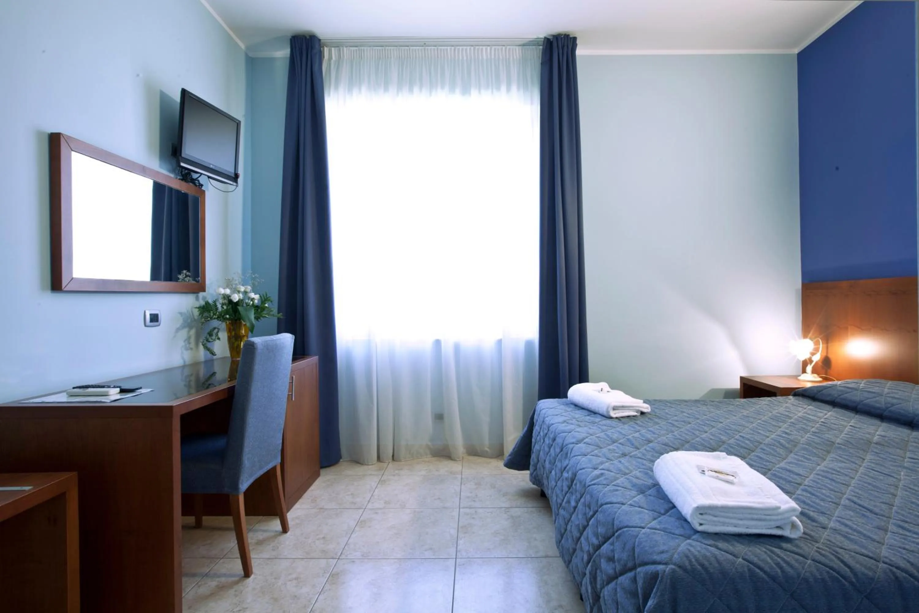 Bedroom in Hotel San Martino