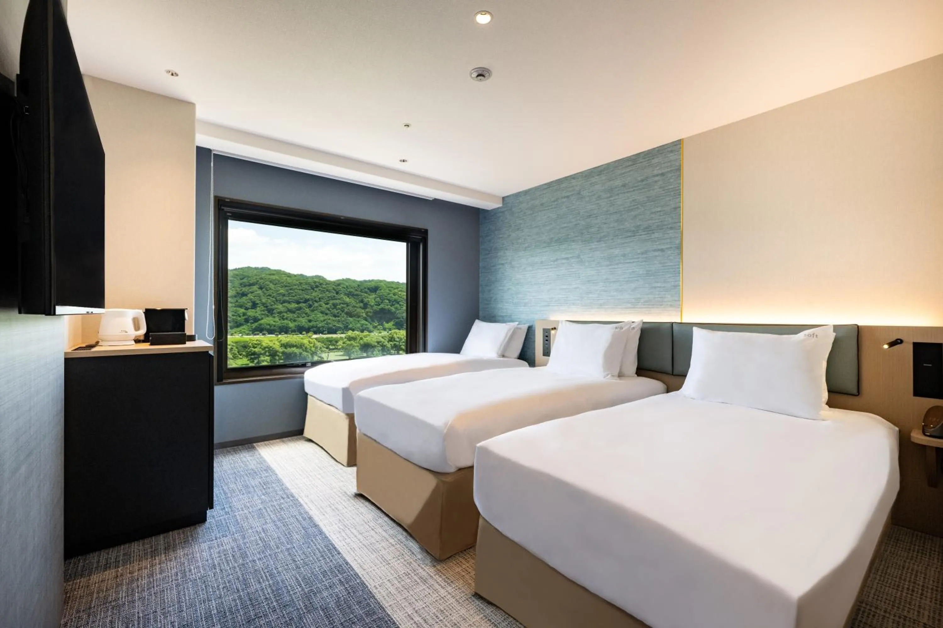 Bed in ANA Holiday Inn Iwate Kitakami by IHG