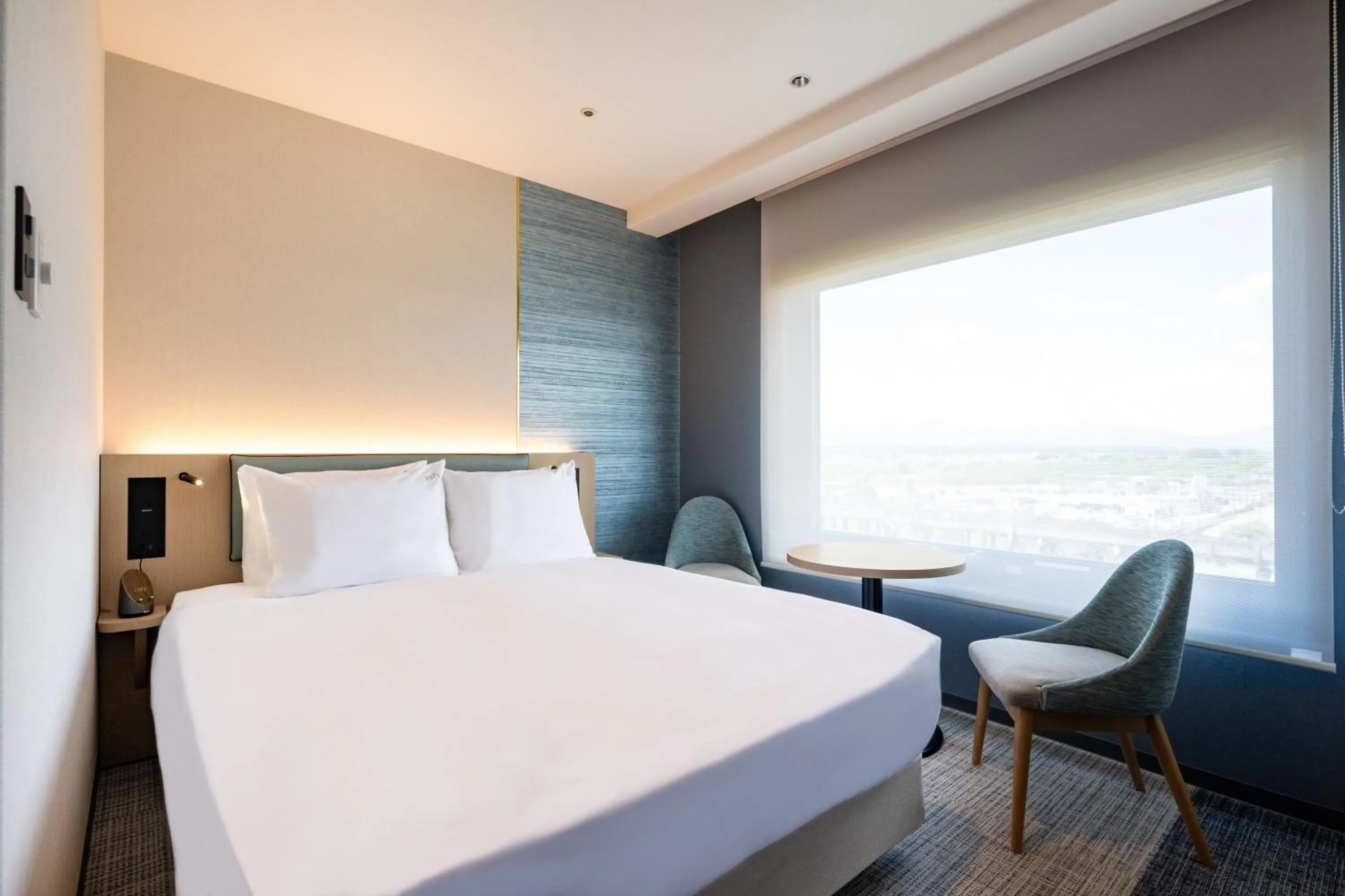 Bed in ANA Holiday Inn Iwate Kitakami by IHG