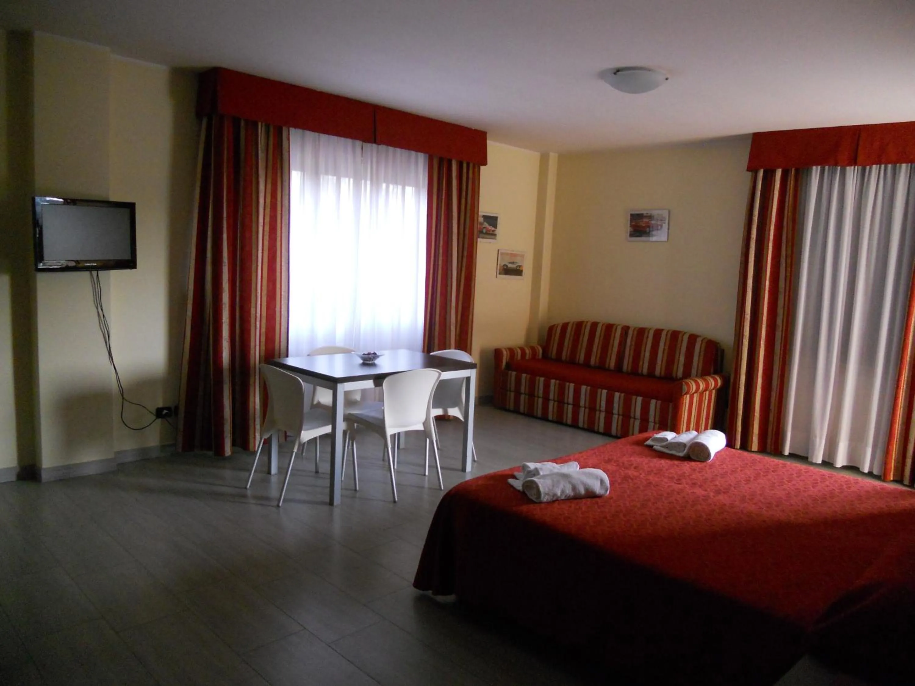 Photo of the whole room, Bed in Residence San Prospero