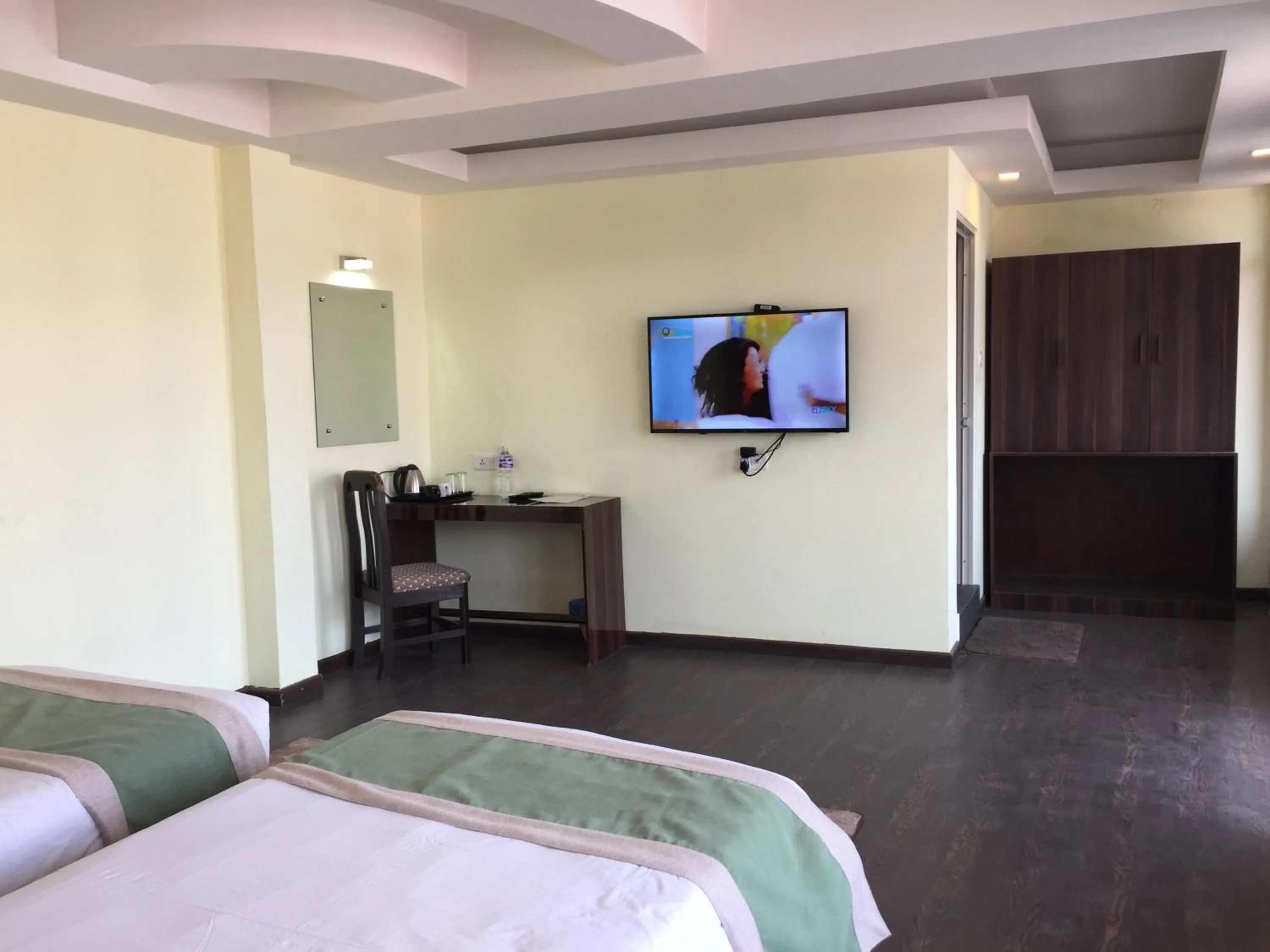 TV and multimedia, Bed in Hotel Serenity Kathmandu