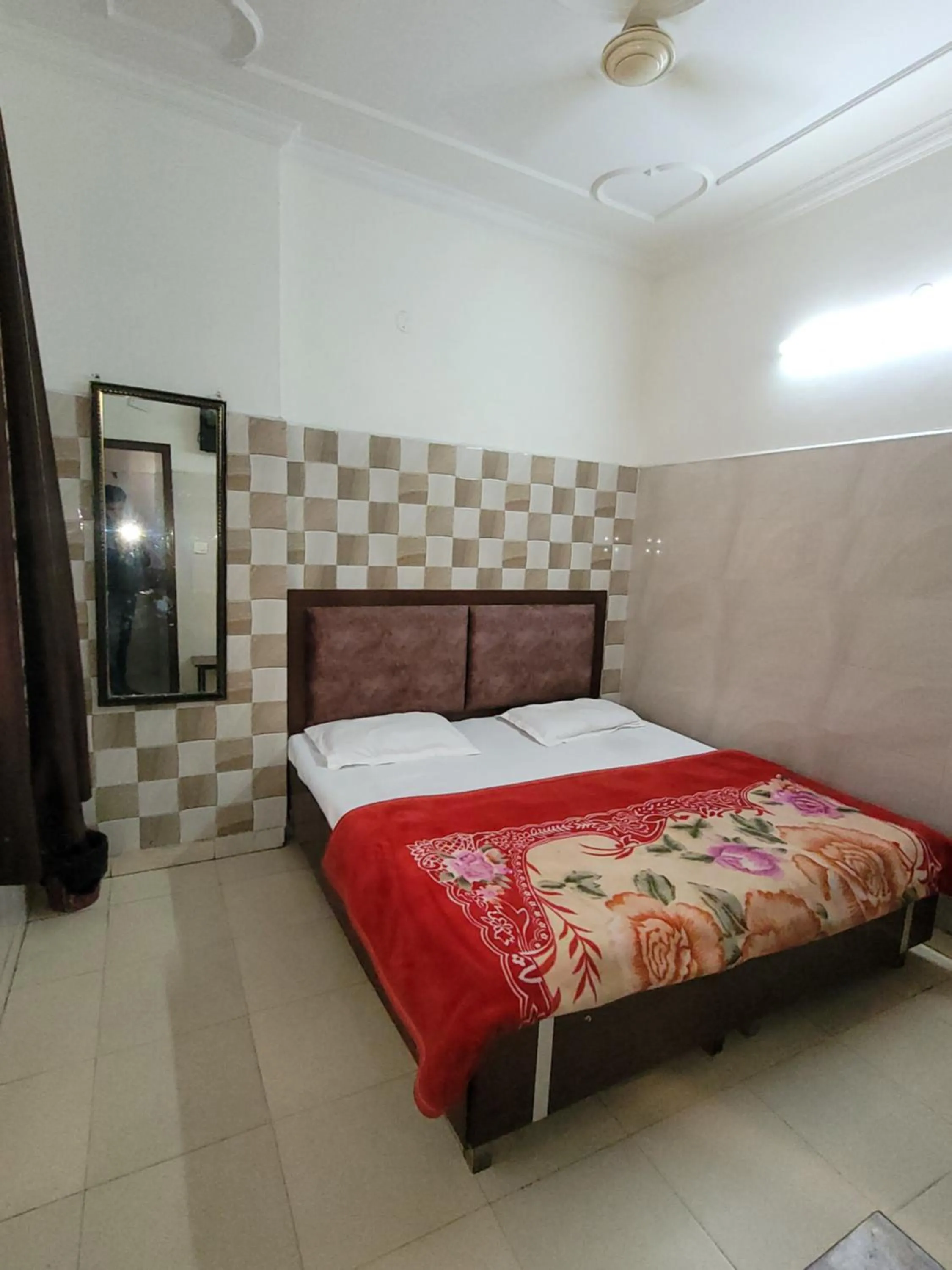 Bed in Asha Guest House